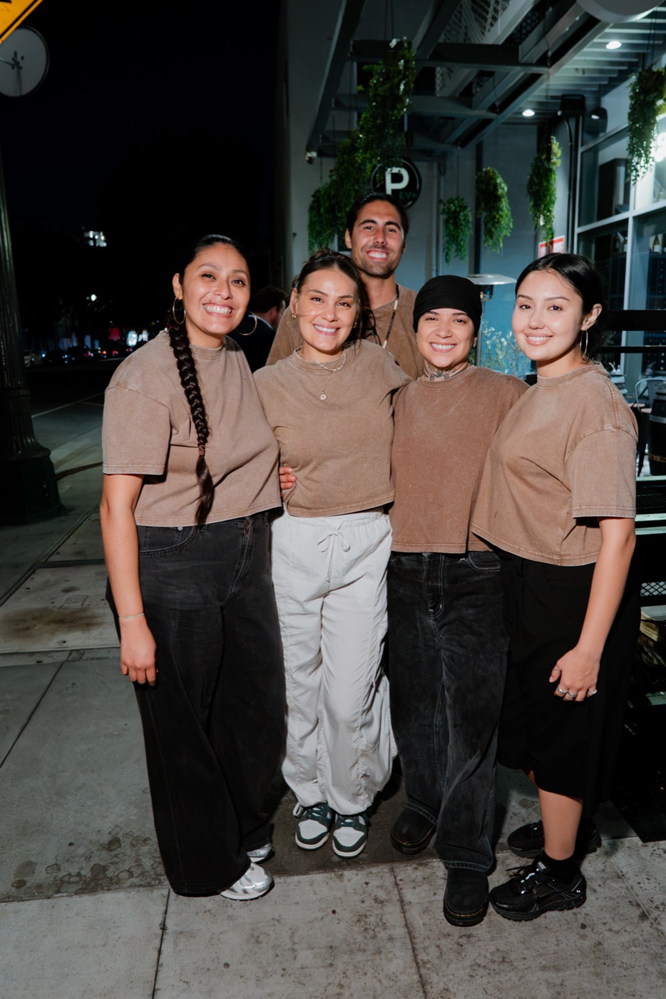 The team smiling together