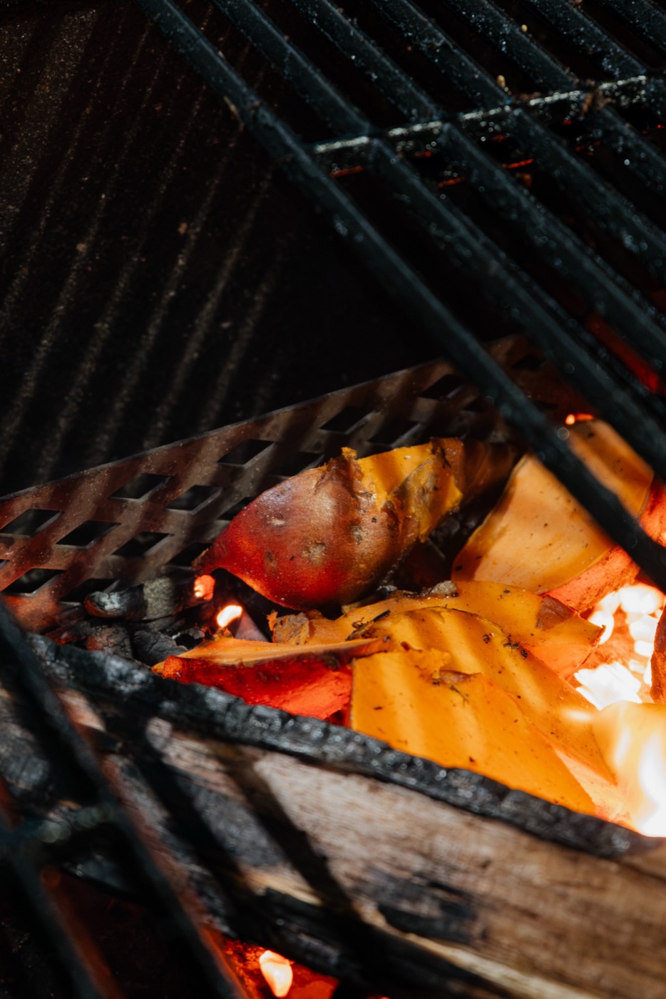 Embers glowing under the grill