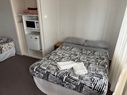 Self-contained apartment lounge and kitchenette