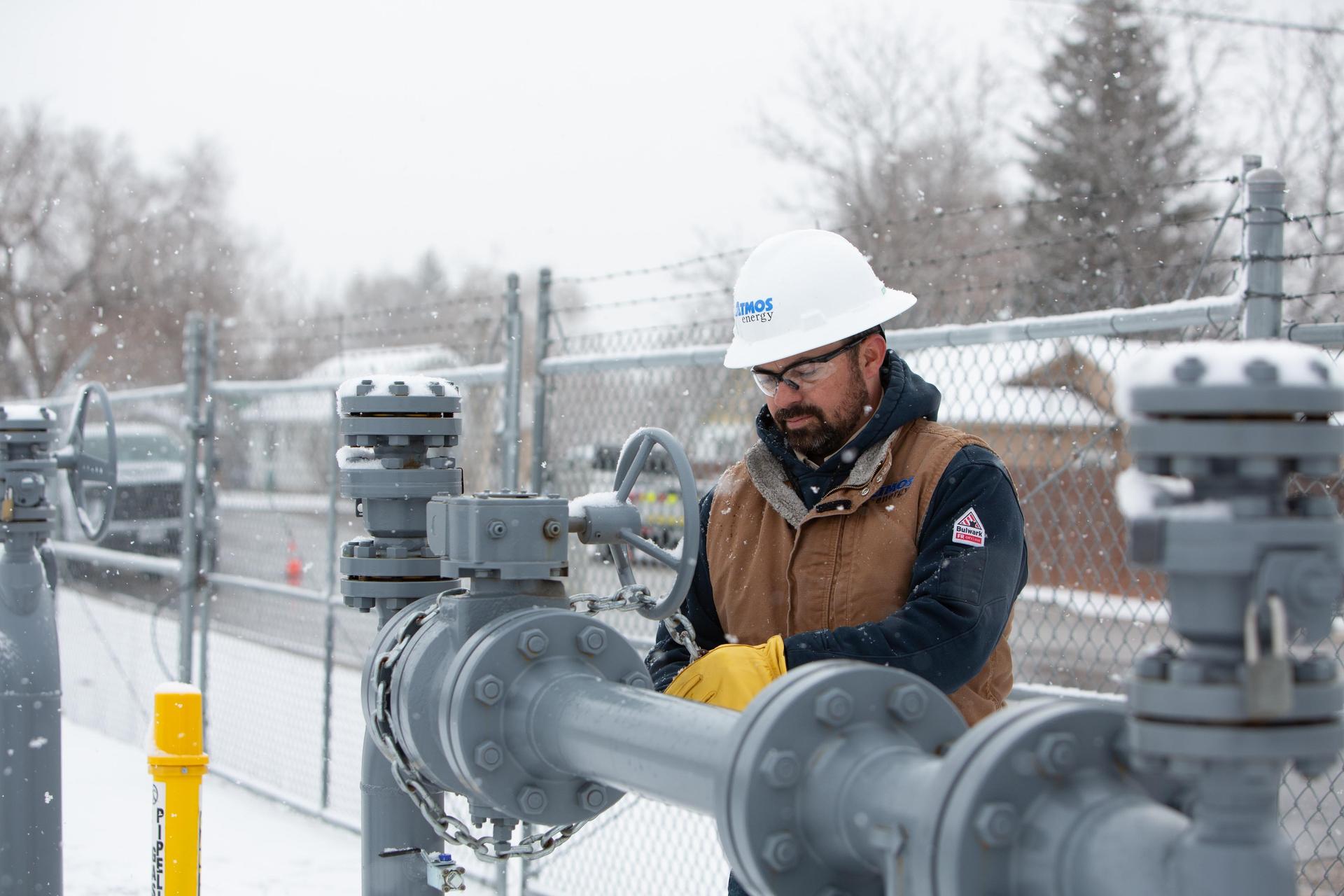 Natural gas utility workers in winter