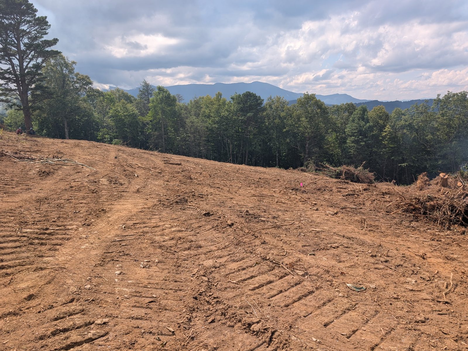 Freshly cleared mountain ridge opening up a Blue Ridge view, land clearing by Western Carolina Earthworx