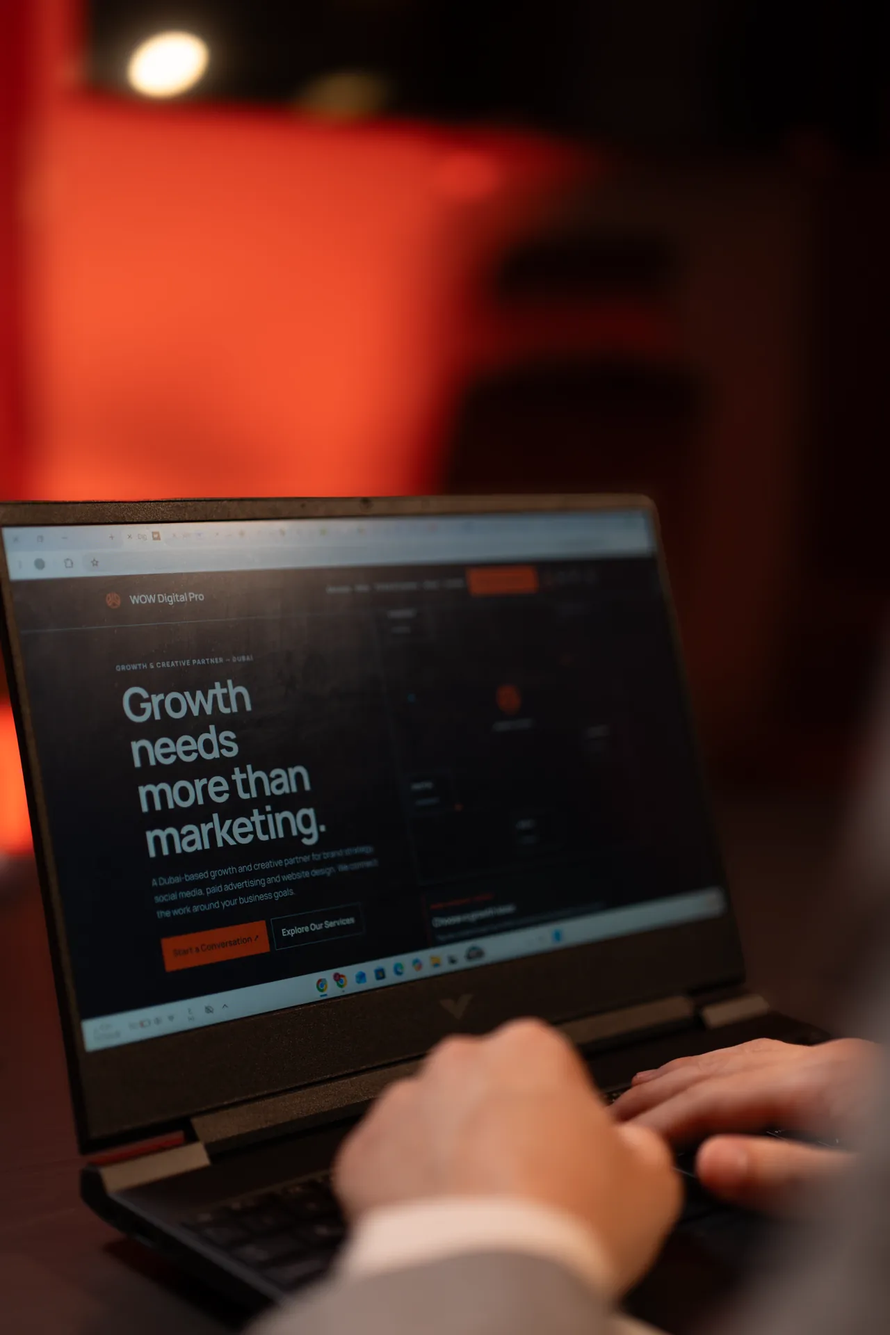 WOW Digital Pro marketing website displayed on a laptop
