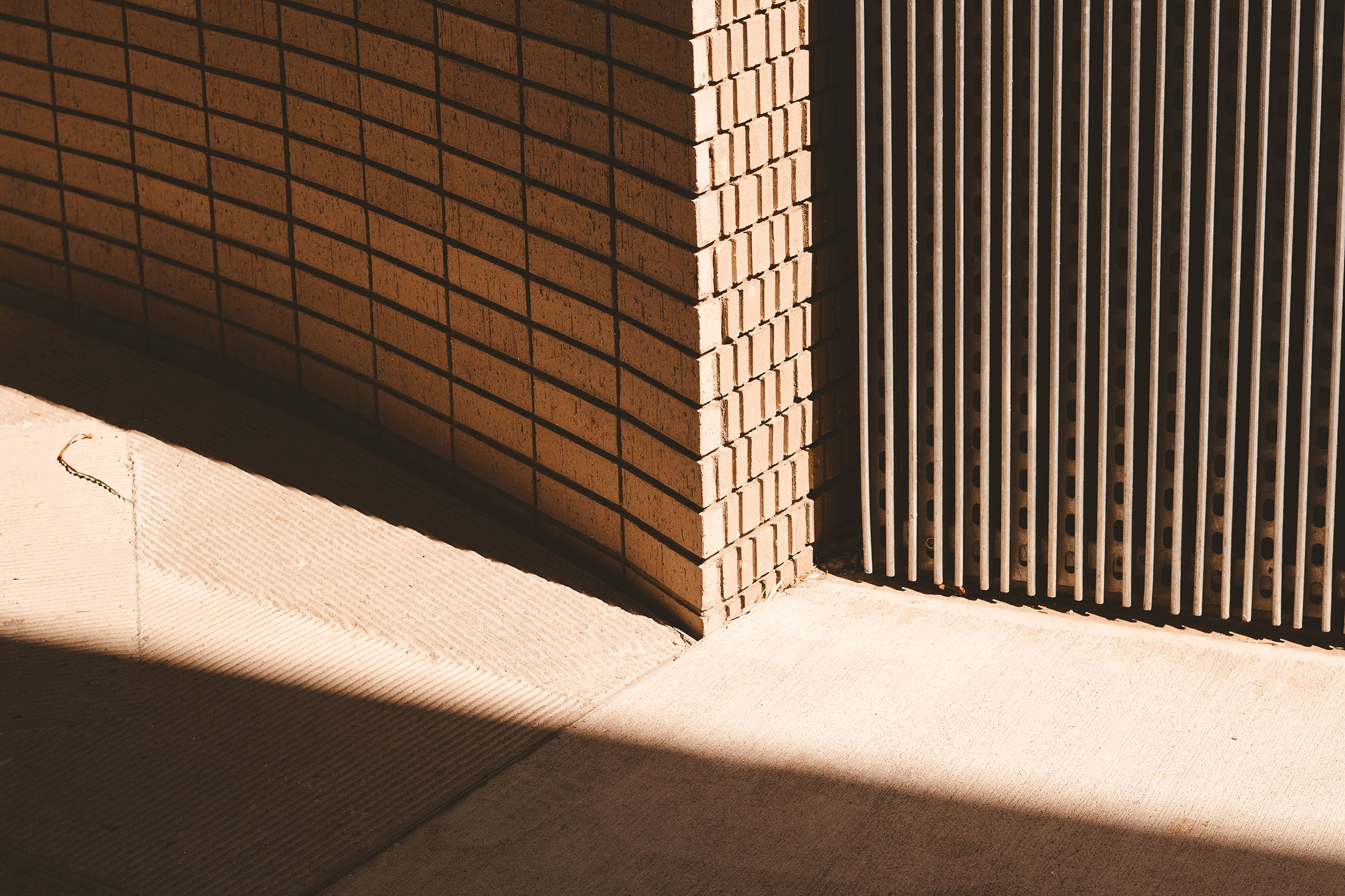 Architecture brick corner shadow, AI-generated image by 35milimetre