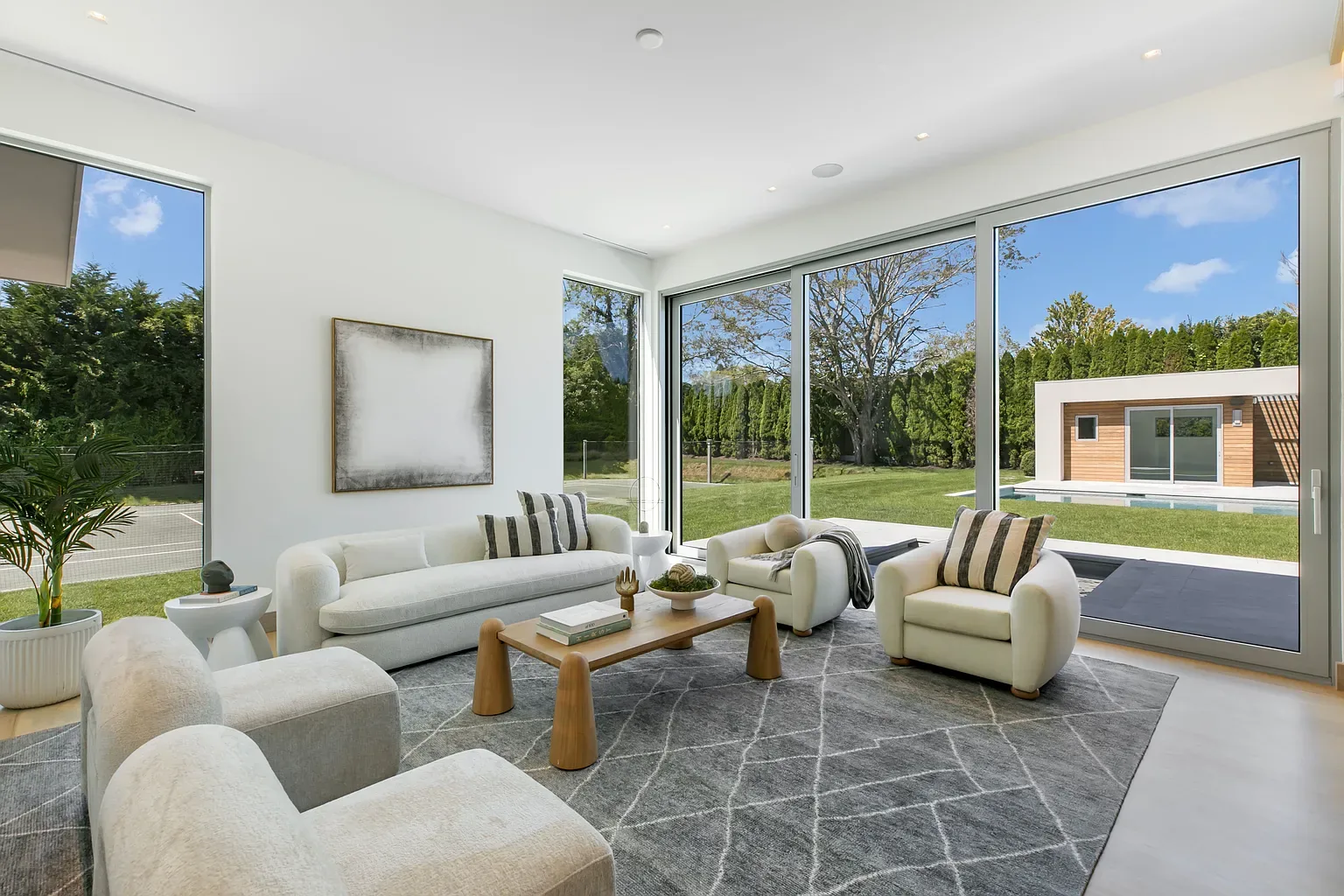 Minimal-frame aluminum sliding doors in a modern living room