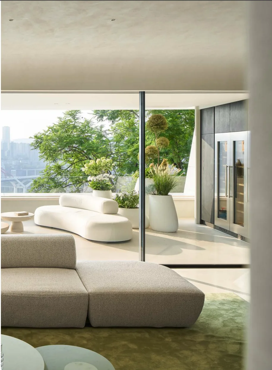 Apartment with a slim aluminum slider opening to a terrace with a city view