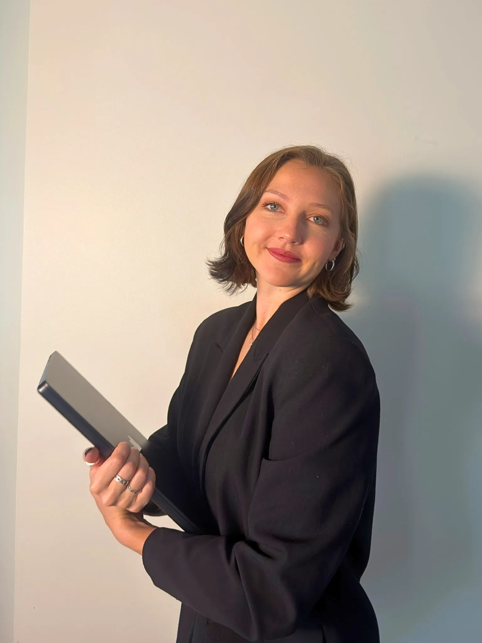 Jessie Borgmann holding a tablet