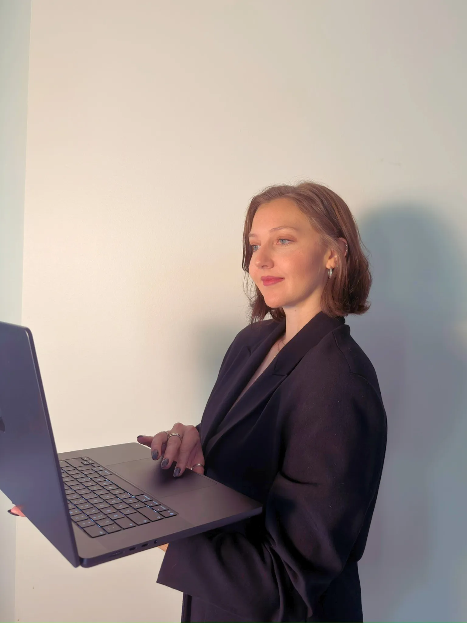 Jessie Borgmann working on a laptop