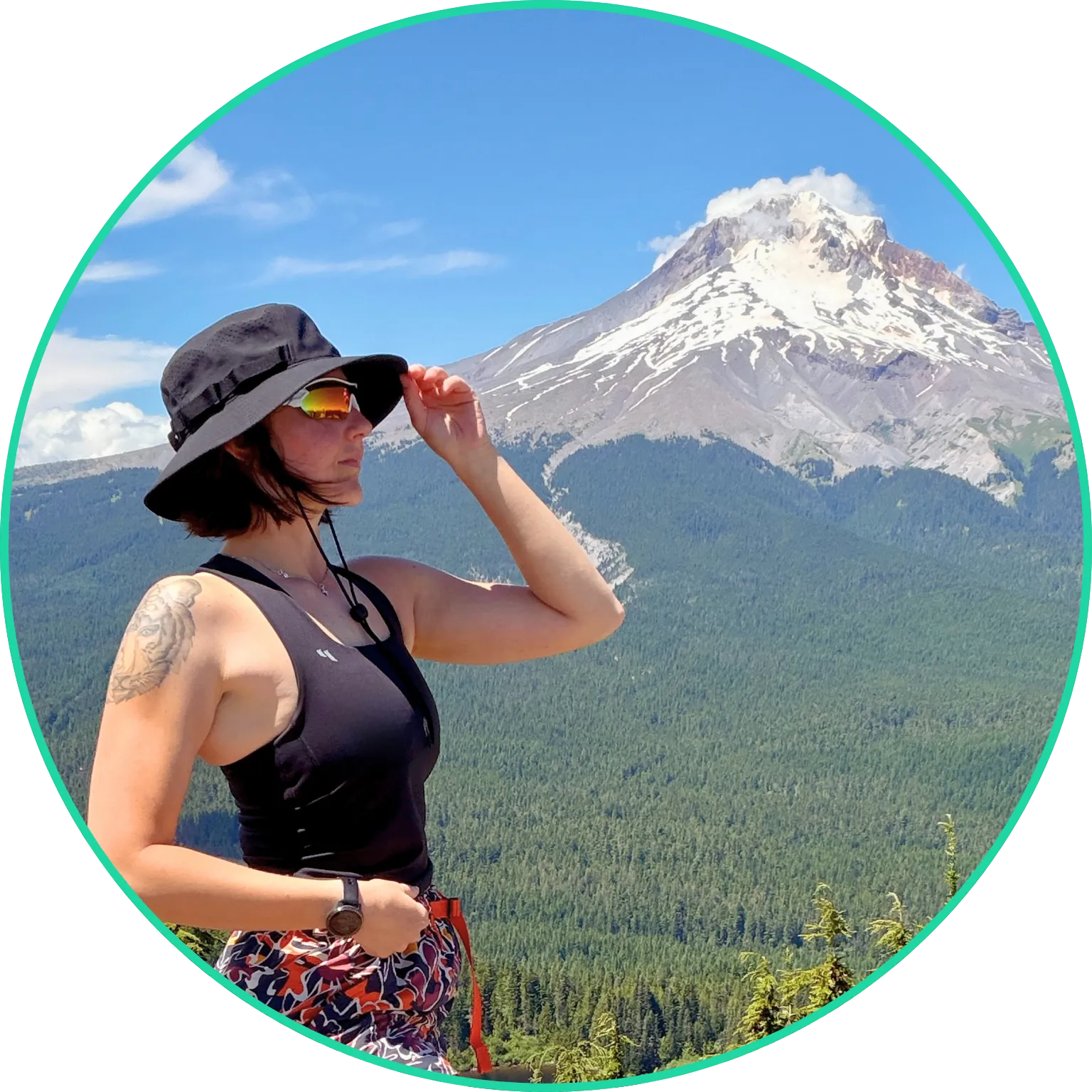 Jessie hiking in front of a mountain