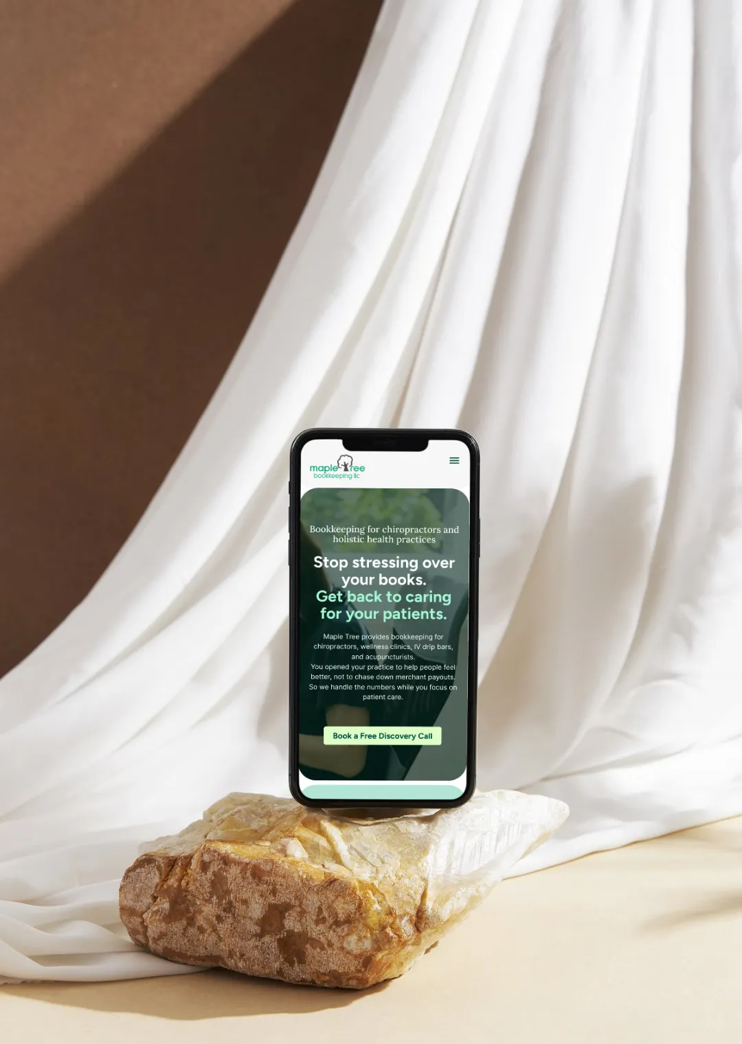 Maple Tree Bookkeeping mobile site on a phone