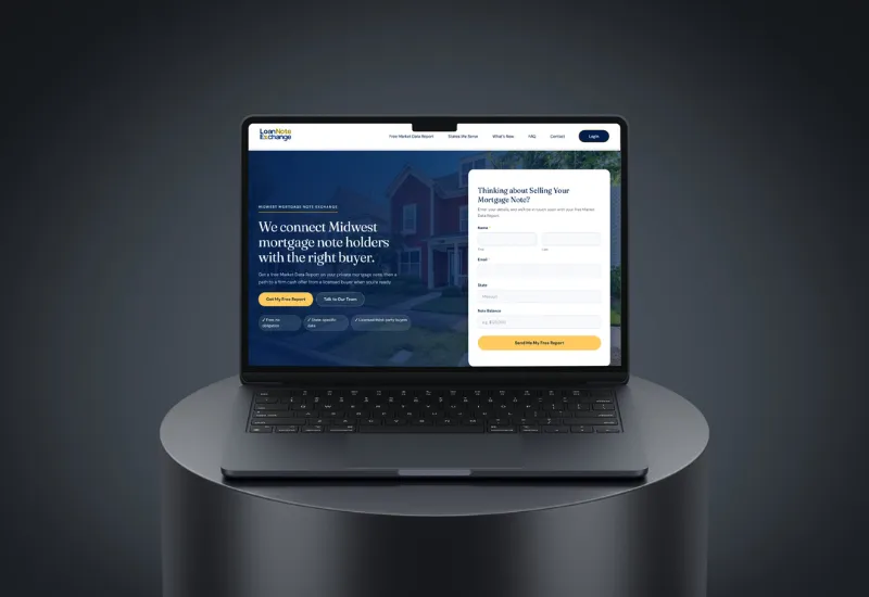 Loan Note Exchange website on a laptop
