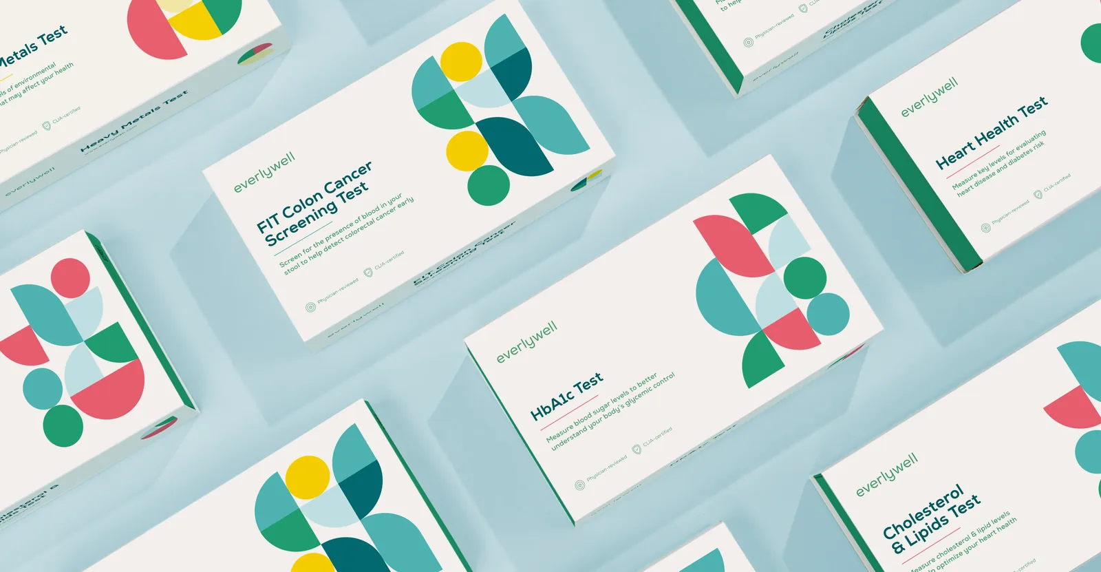 An arrangement of Everlywell at-home health test kit boxes