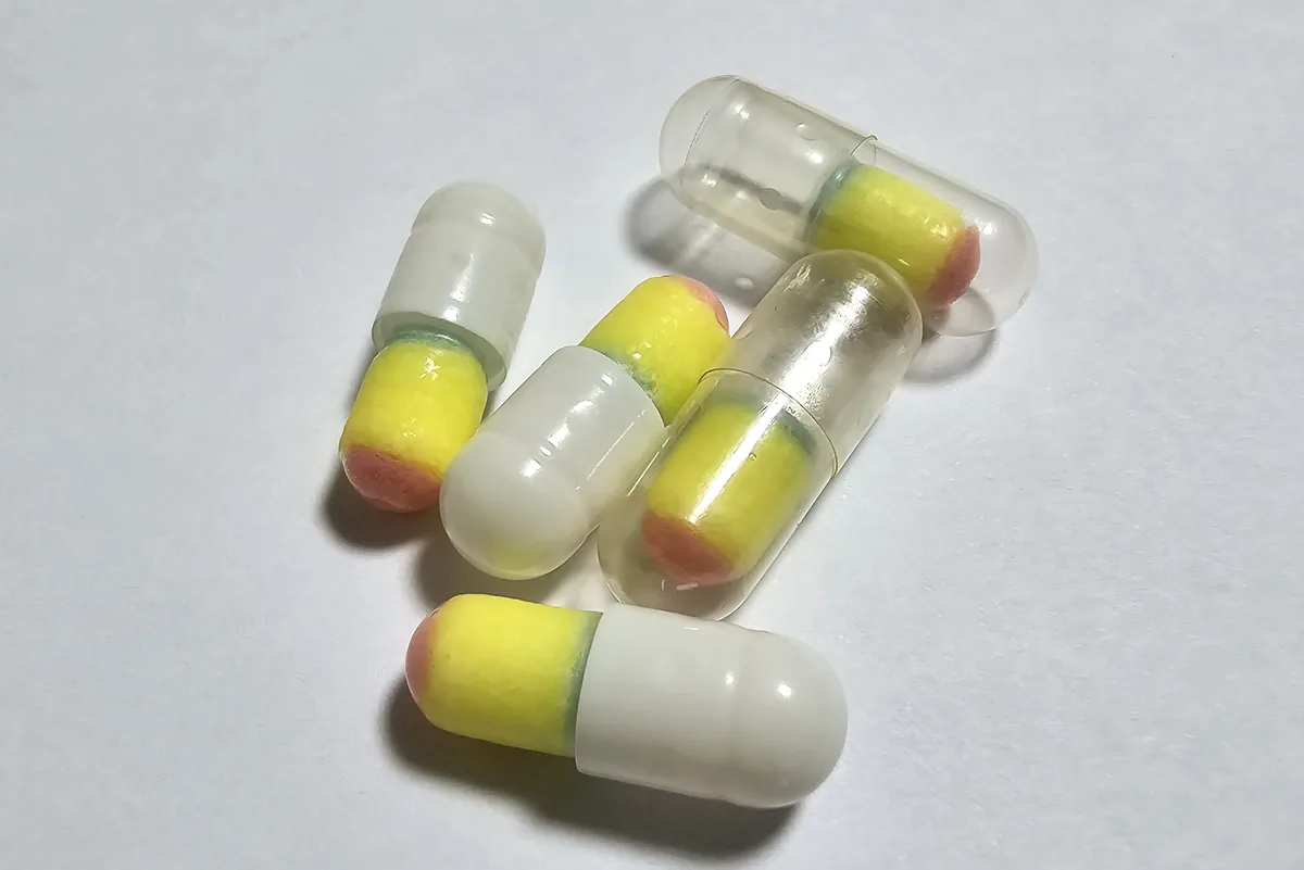 3D-printed multi-layer capsule inserts