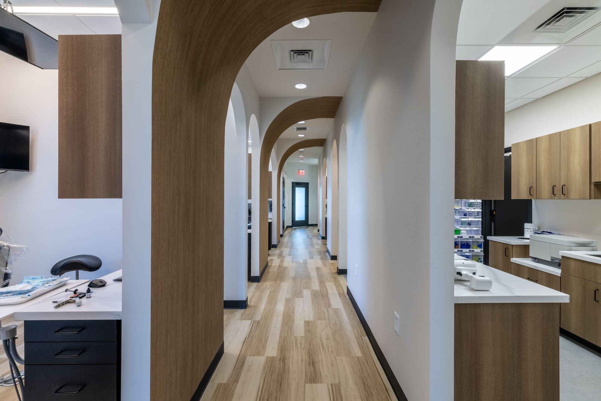 Arched hallway leading to the treatment rooms