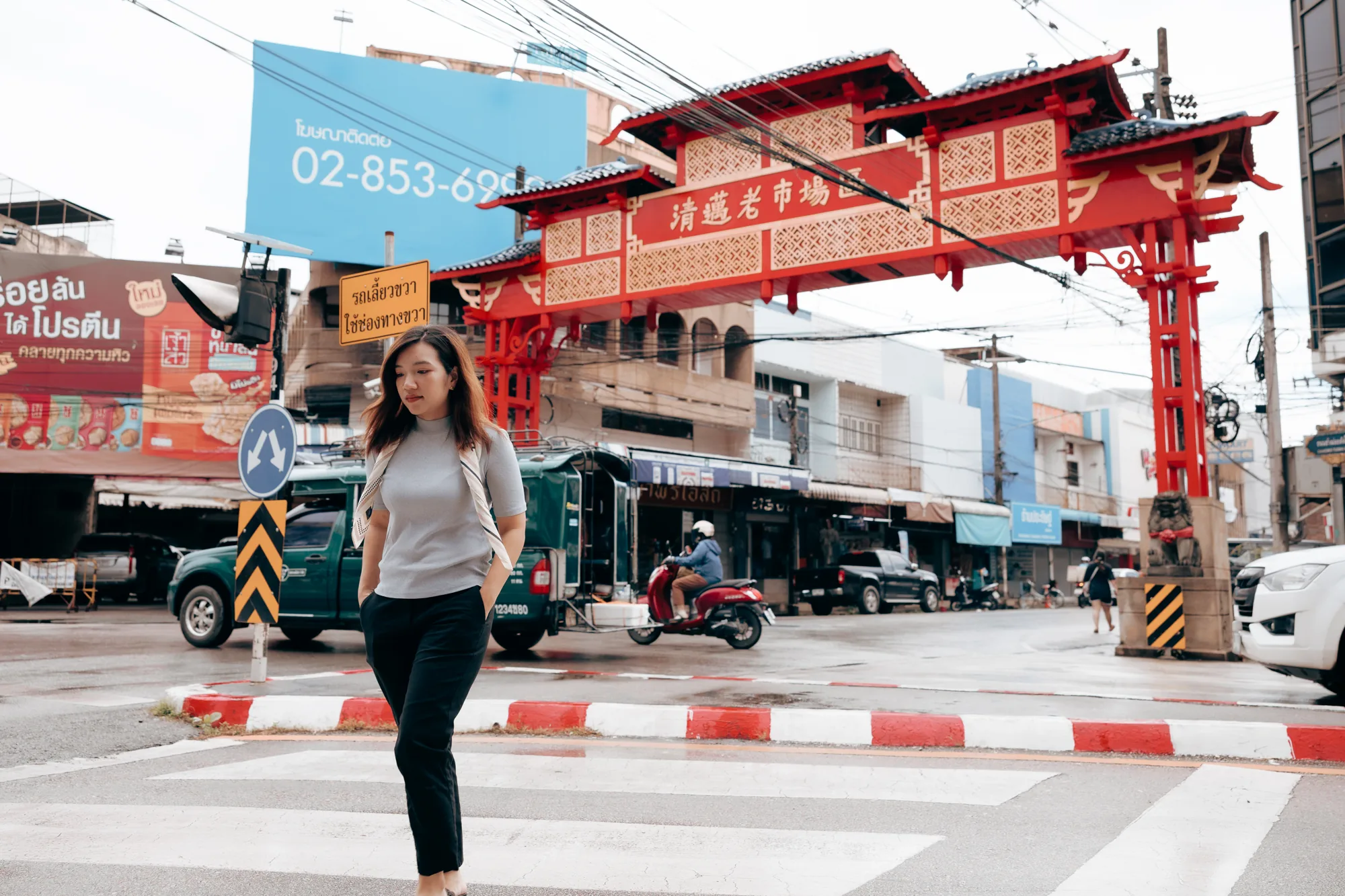Aom crossing the street in Chiang Mai old town