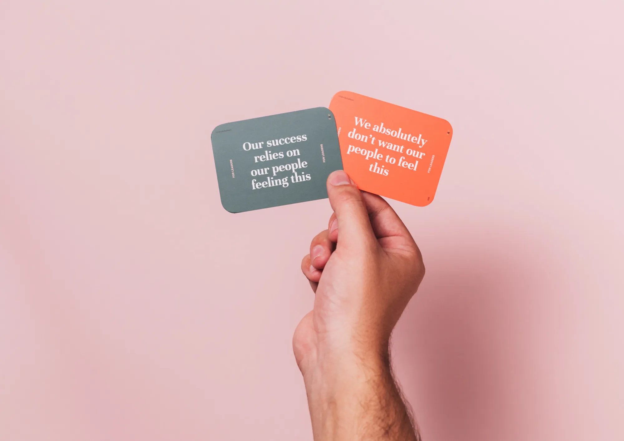 A team around a table, each working through their own Emotional Culture Deck