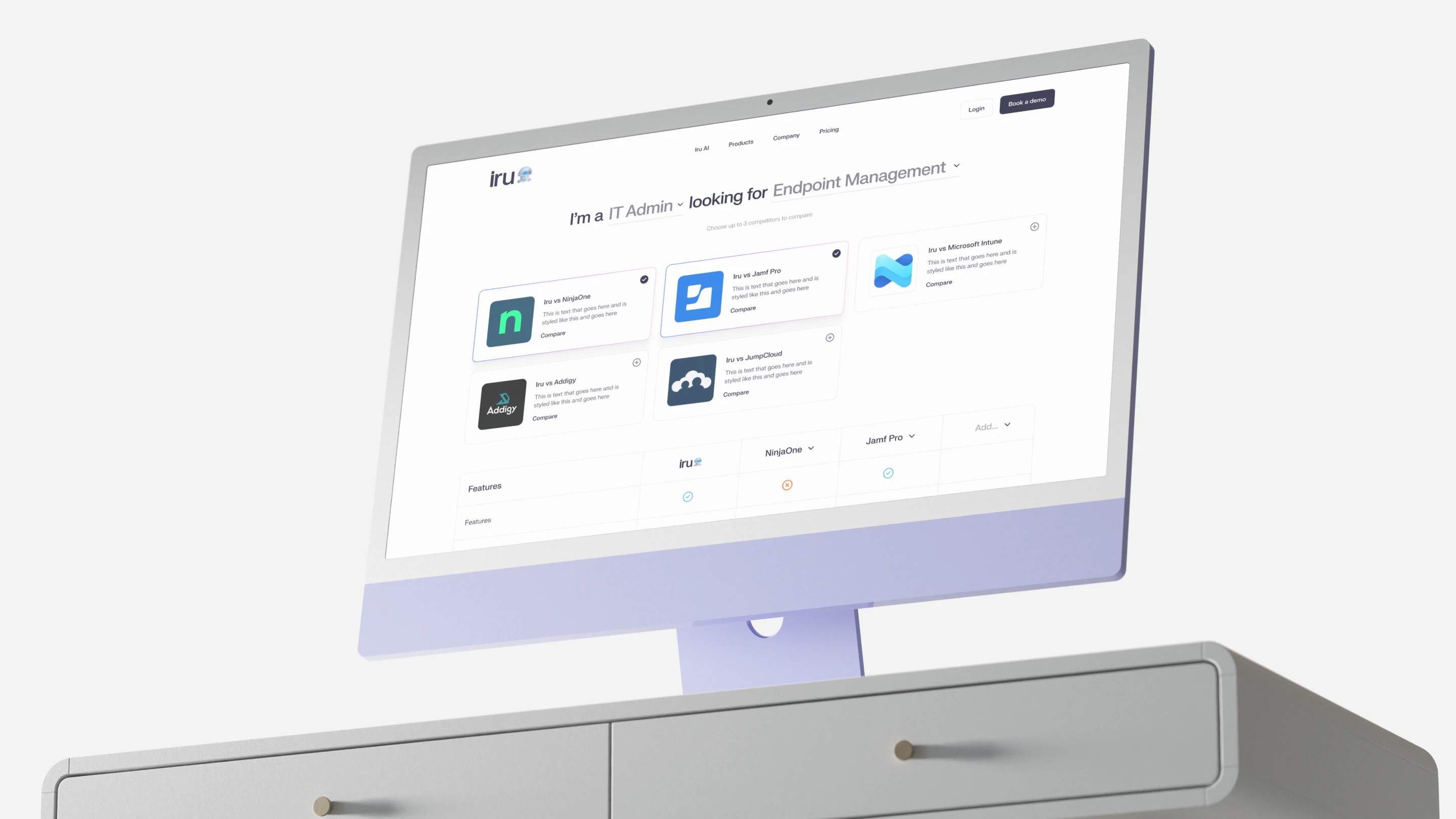 A lilac iMac on a desk showing the Iru compare page: I'm an IT Admin looking for Endpoint Management