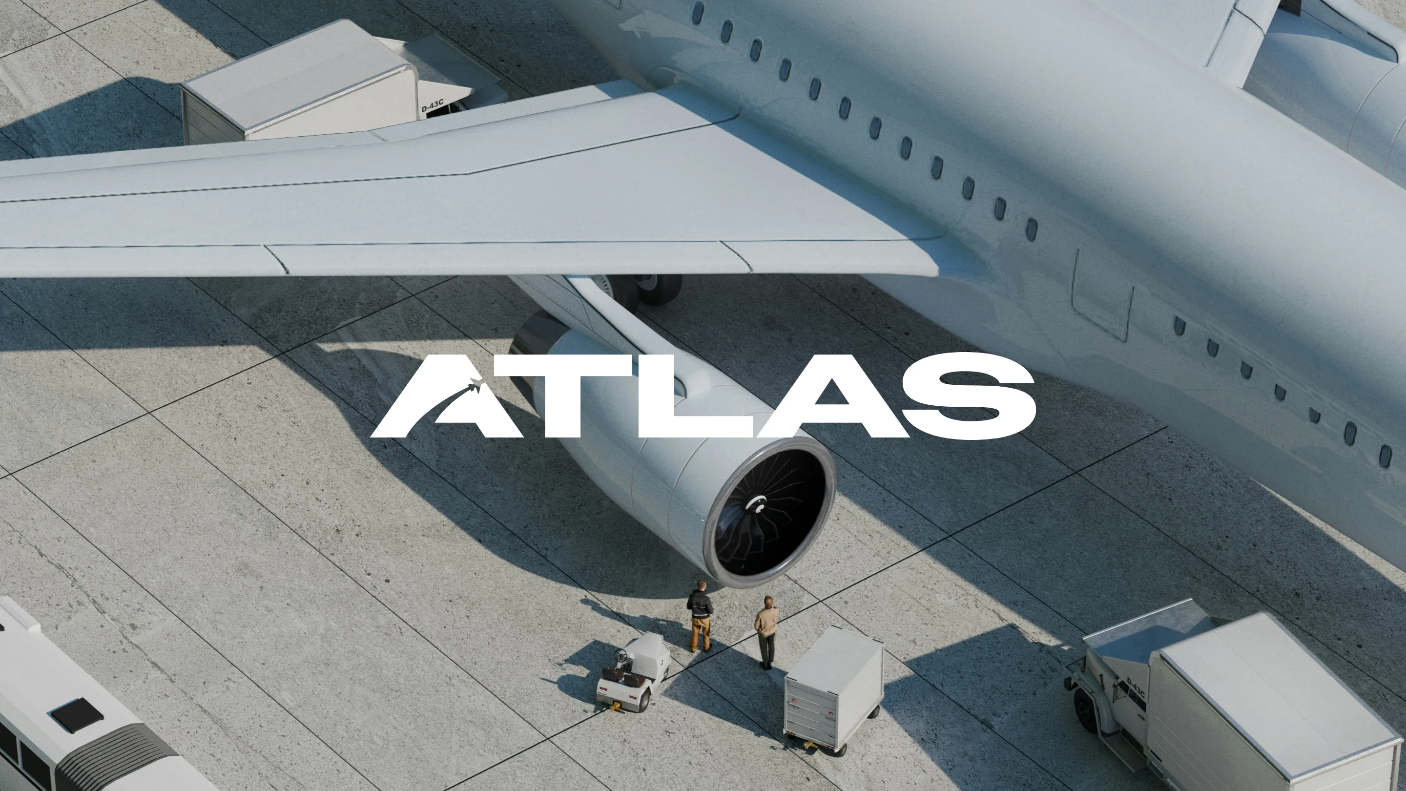 The Atlas logotype over an aerial view of an airliner’s wing and engine on the apron