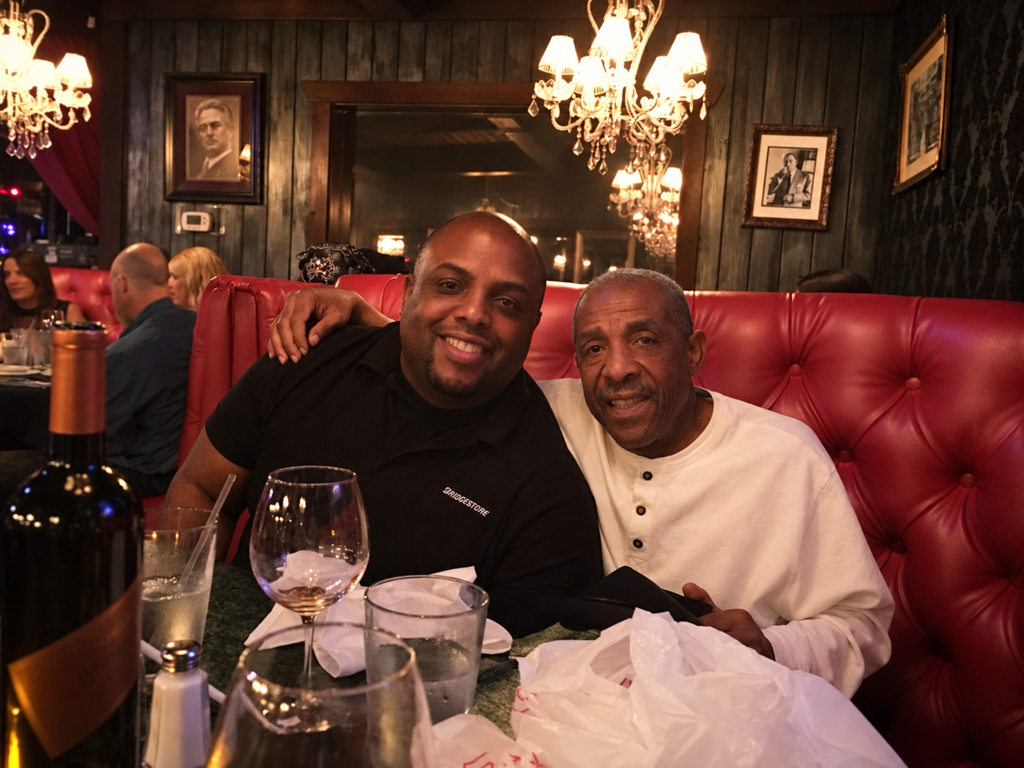 Allen Robinson with his father, seated together at a restaurant