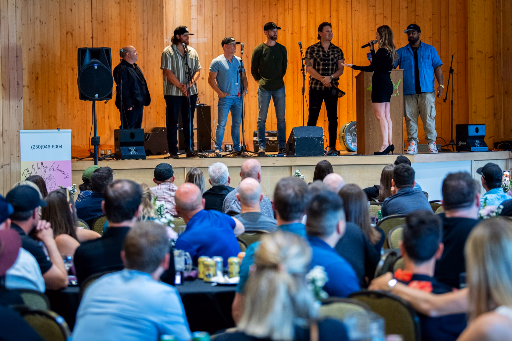 Musicians on stage at a Community First Society fundraising dinner