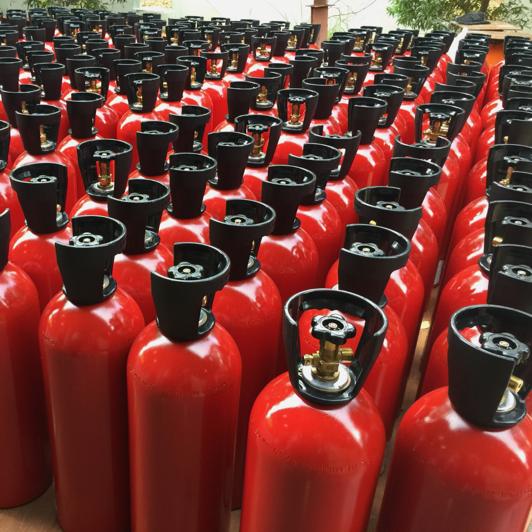 Rows of red aluminium cylinders