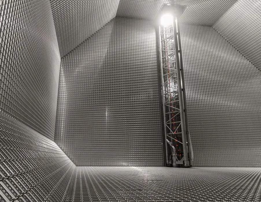 Inside a membrane LNG cargo tank with its pump tower