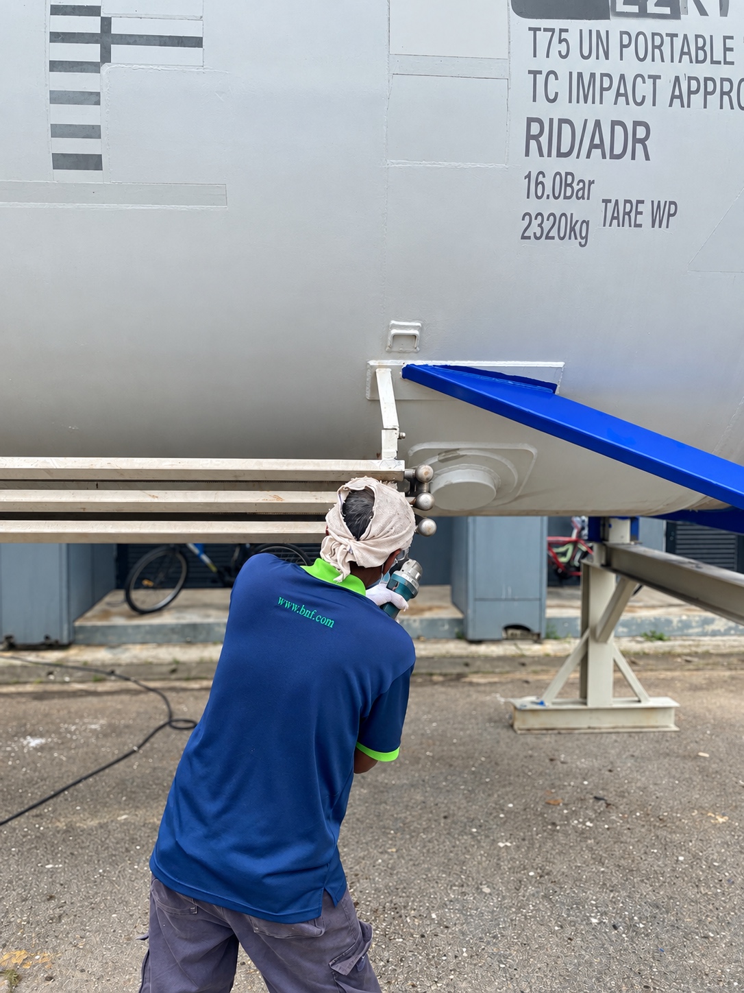BNF T75 ISO tanks in their blue frames in the workshop