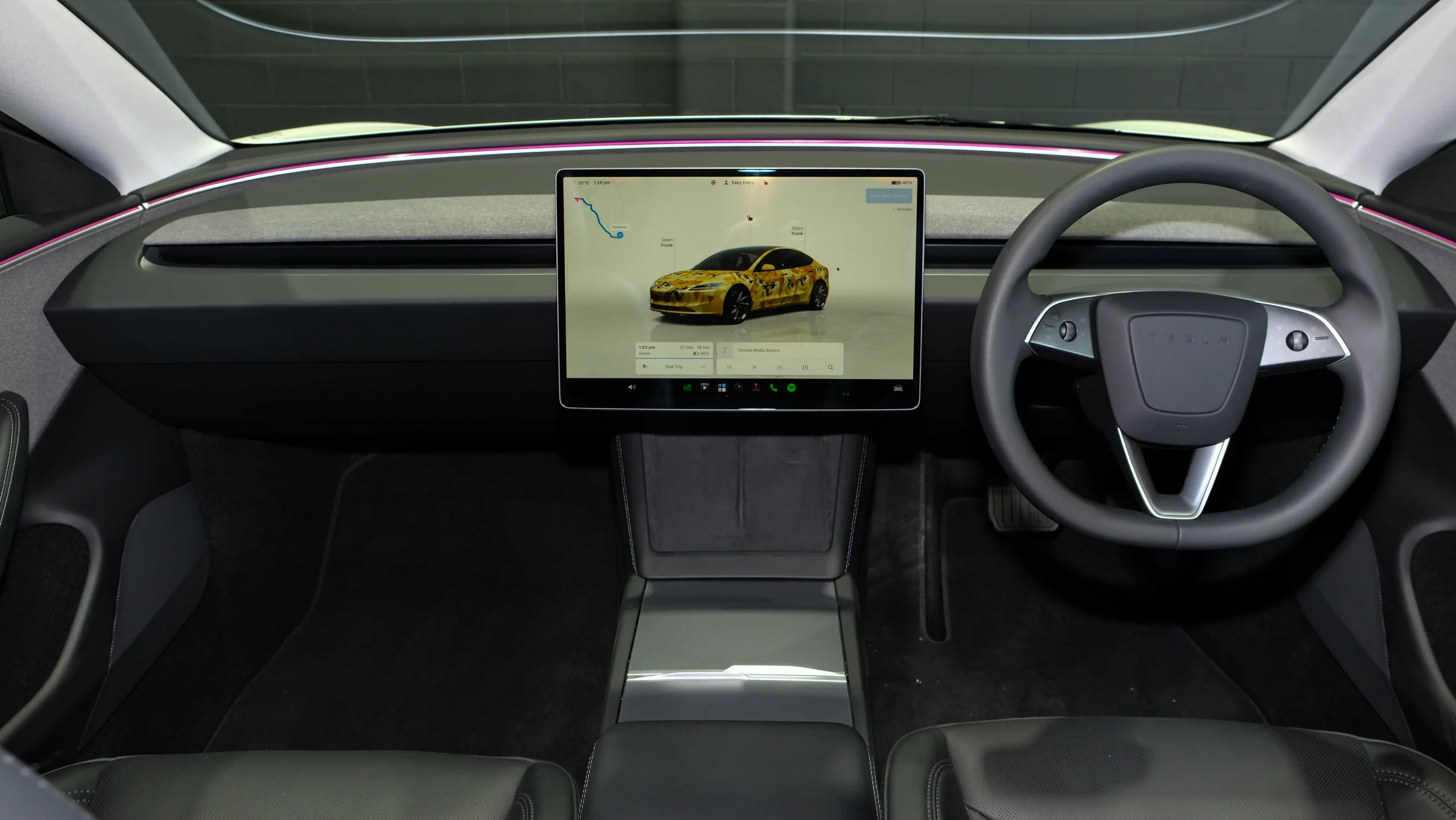 Tesla Model 3 dashboard and touchscreen inside the Safeway Auto showroom