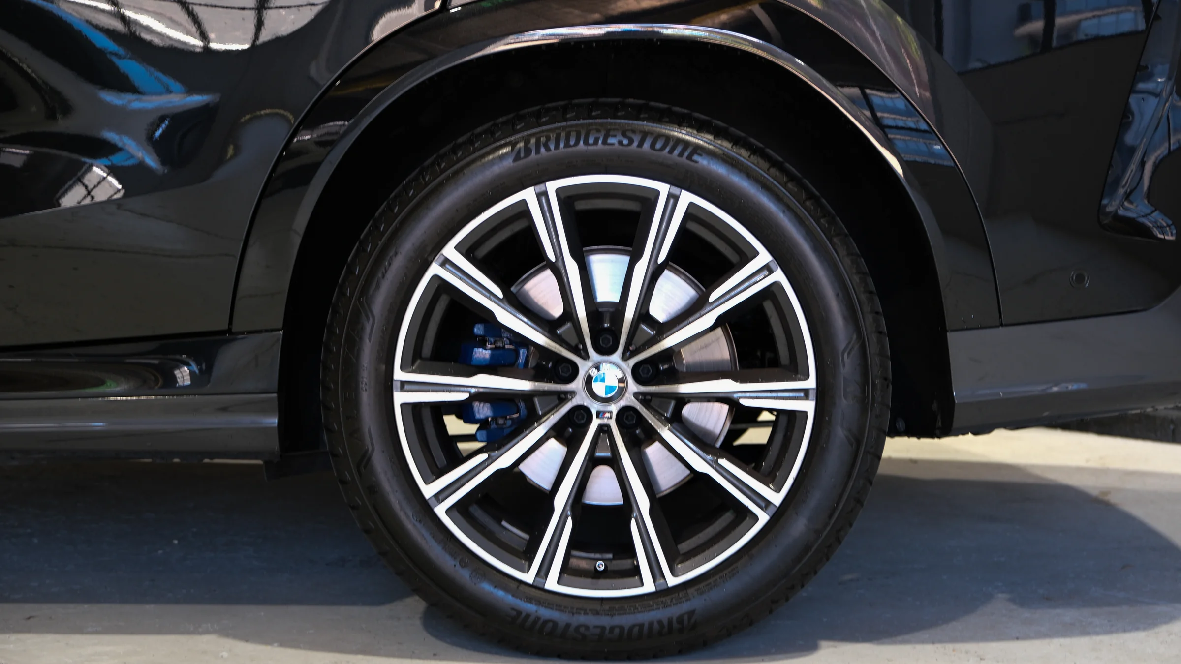 Wheel, tyre and brake of a used SUV in the Safeway Auto showroom