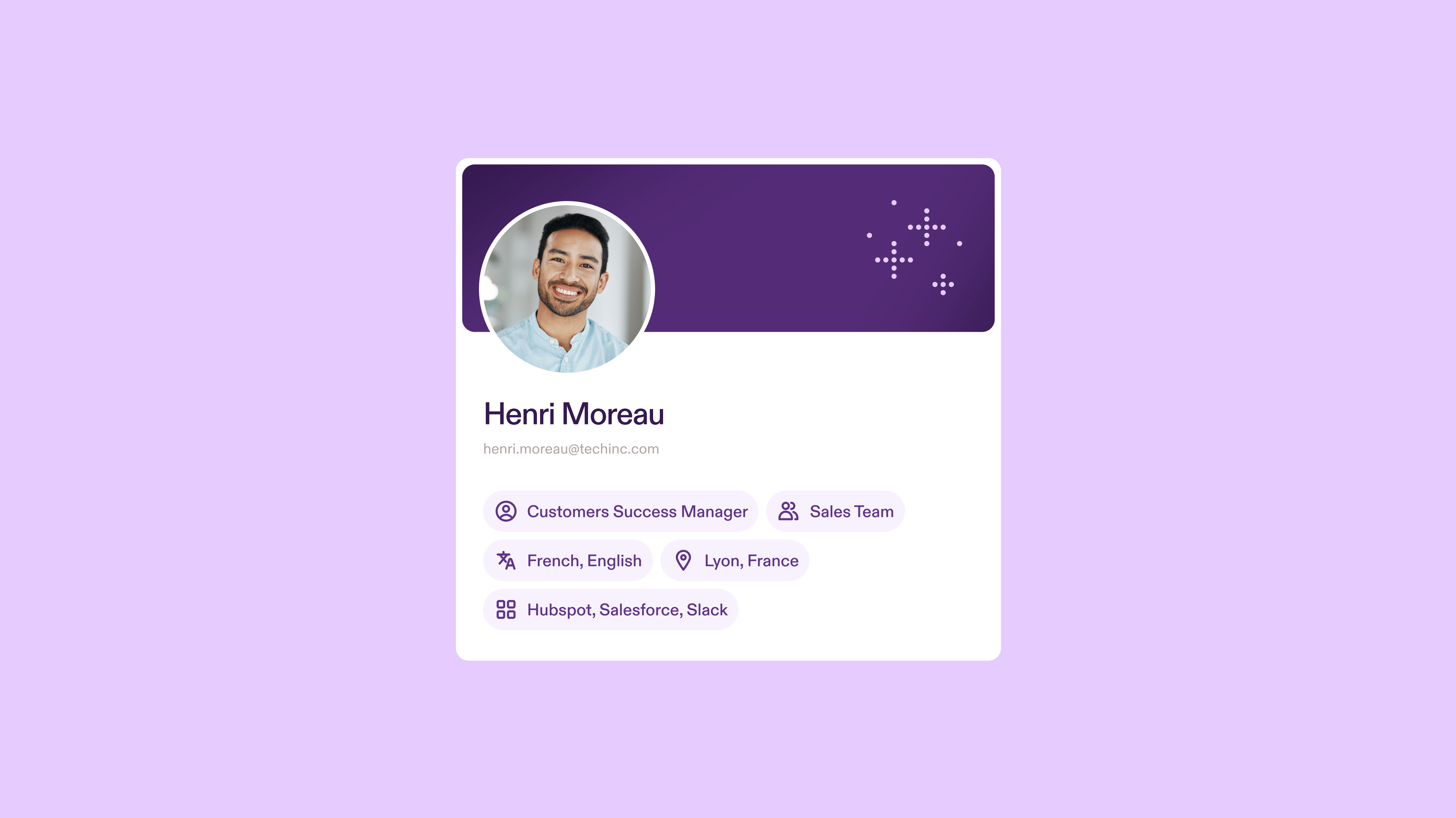 Pistachio employee profile card on a lilac background for Henri Moreau, a Customer Success Manager on the sales team, listing his languages, location in Lyon, France and the tools he uses, including HubSpot, Salesforce and Slack.
