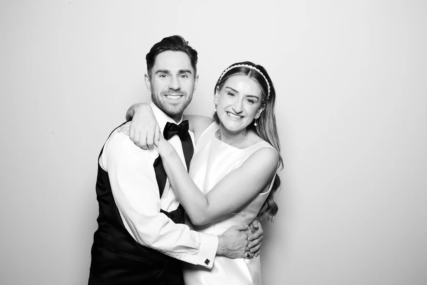 Black and white glam portrait of a smiling couple