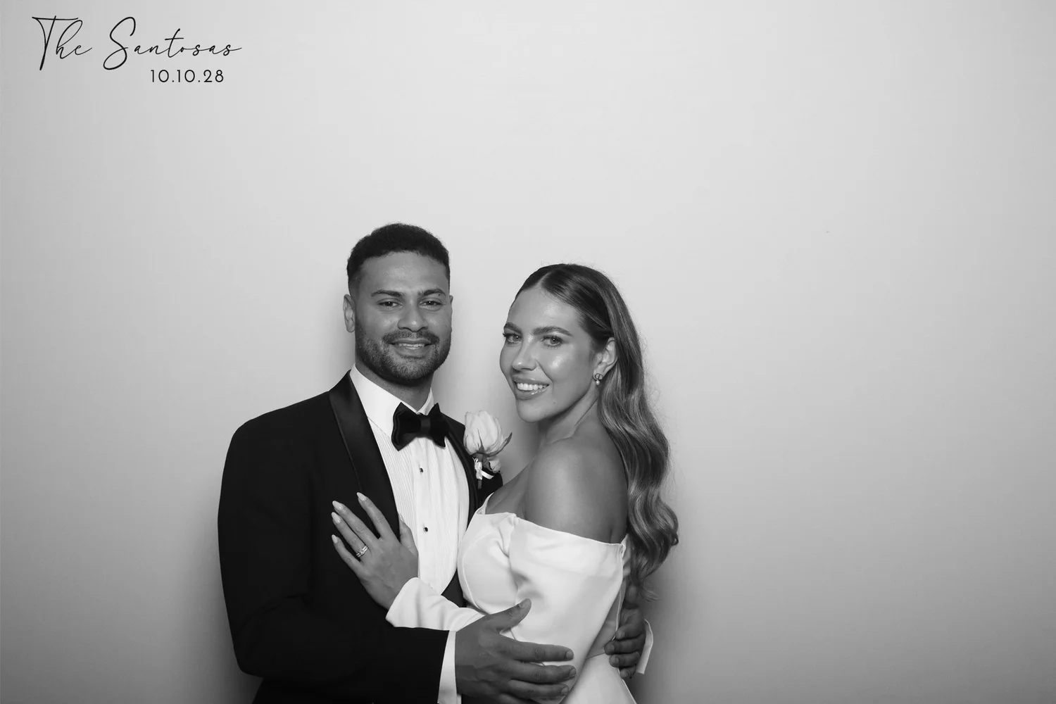 Black and white glam portrait of a wedding couple