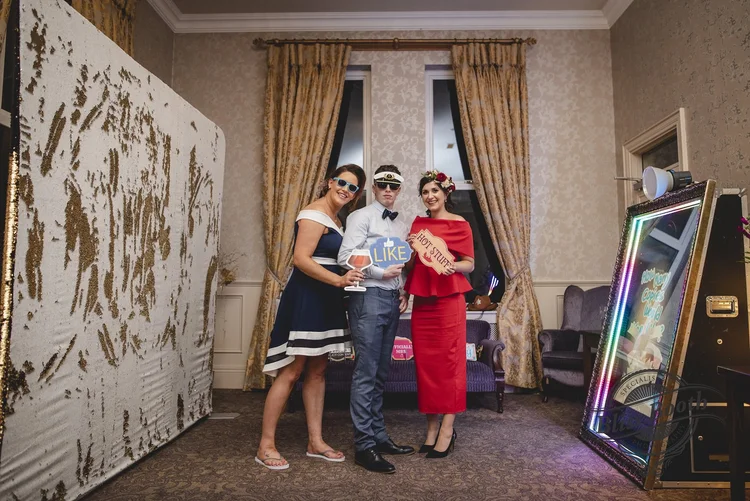 Photo booth backdrop set up at an event