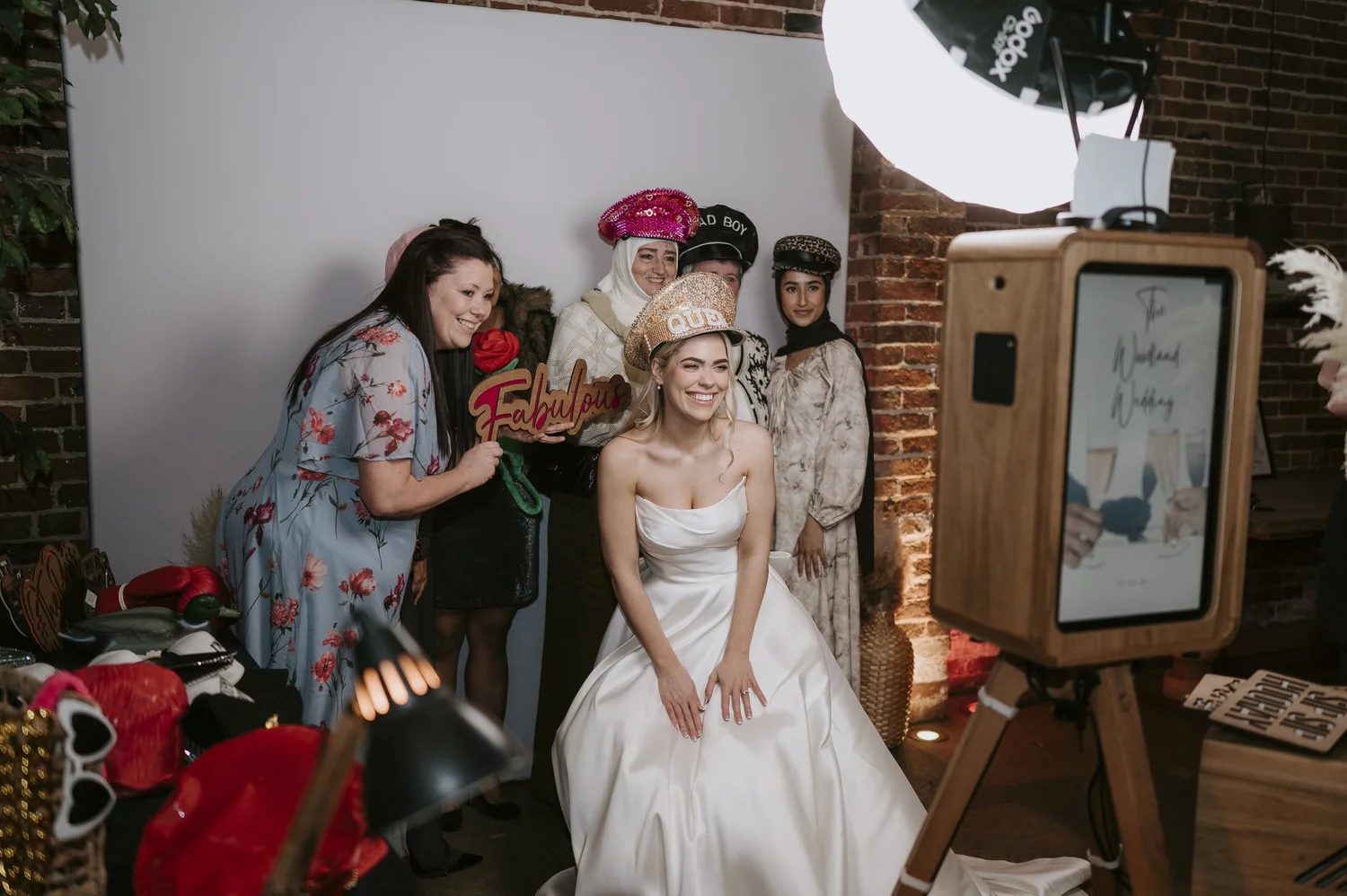 Wedding guests enjoying the Bliss Booth photo booth experience at Hazel Gap Barn. Fun props, instant prints and unforgettable wedding memories captured throughout the celebration at one of Nottinghams