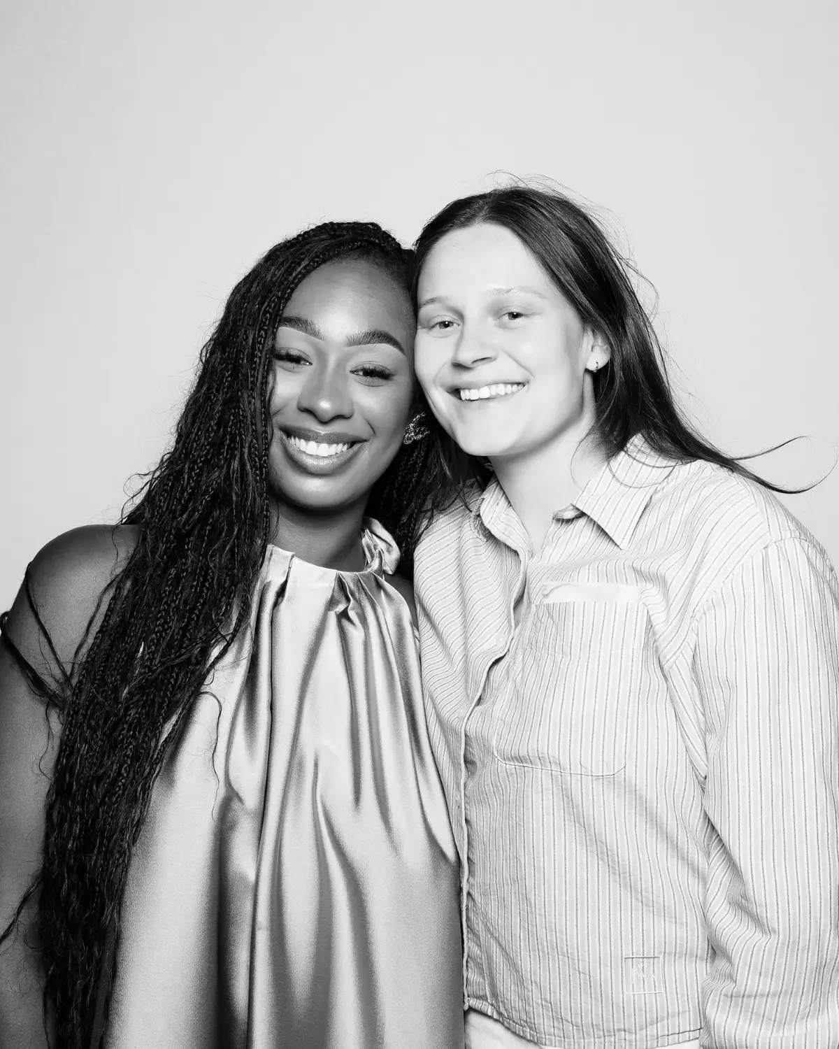 Guests enjoying a Bliss Booth photo booth at a real event