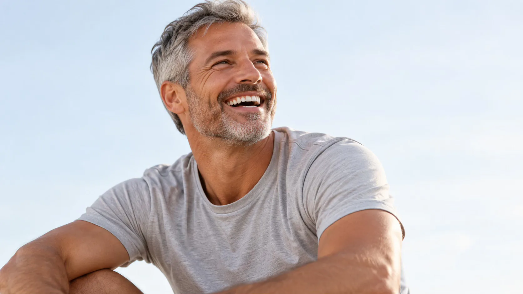 Smiling man outdoors after starting a treatment matched to him