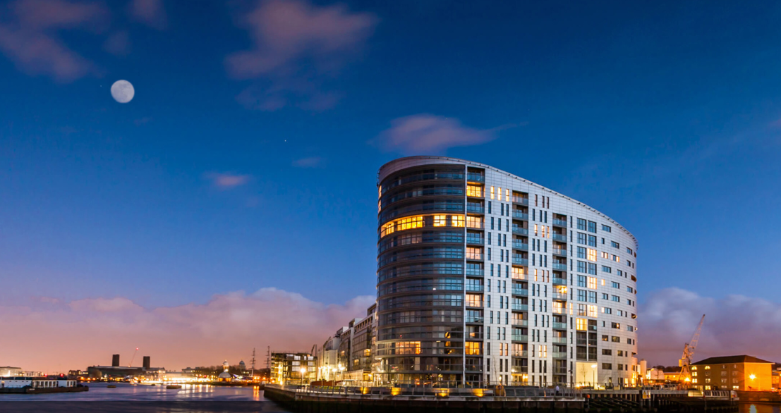 Galliard Homes riverside development at dusk