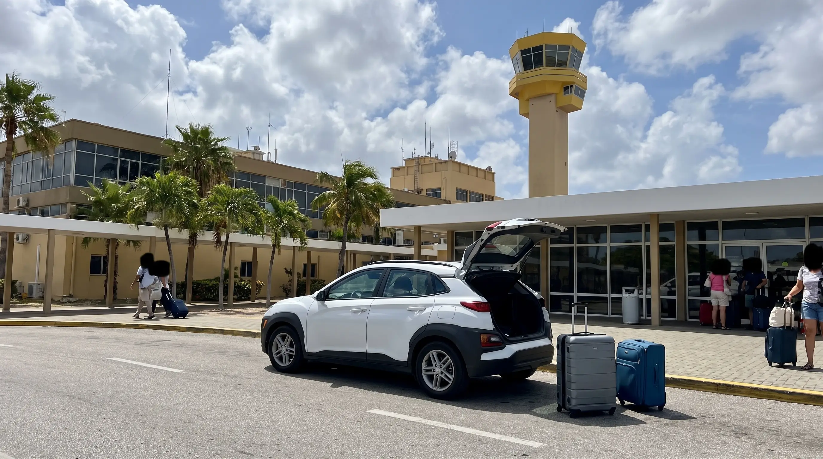 Rental SUV with suitcases at the airport curb in Curaçao