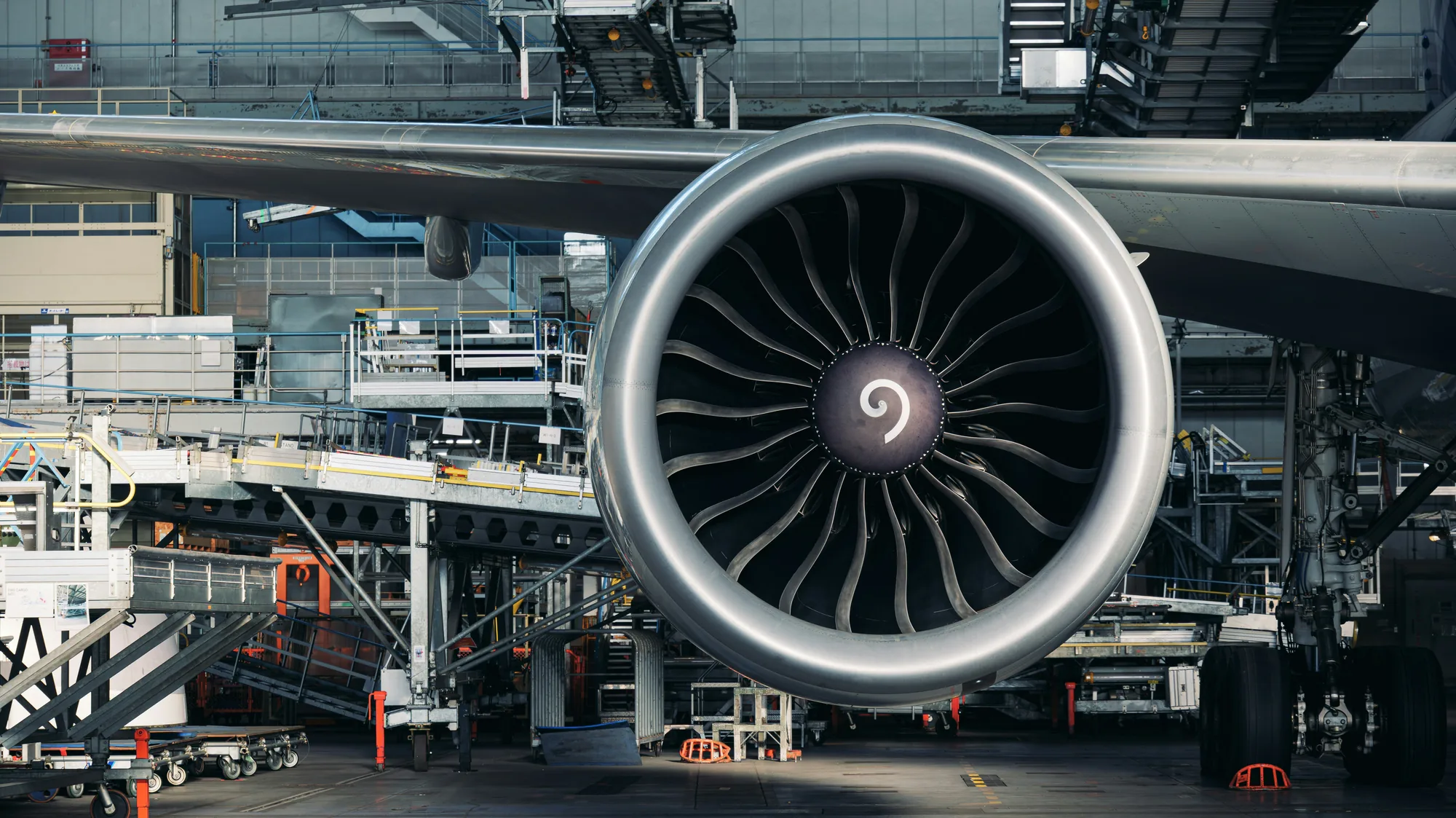 Jet engine in an aircraft maintenance hangar