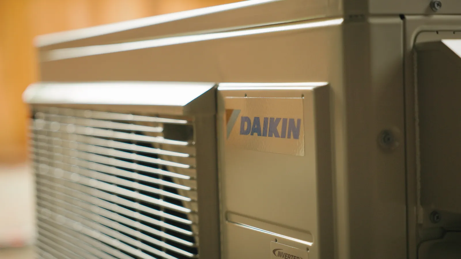 Close-up of a Daikin outdoor heat pump unit