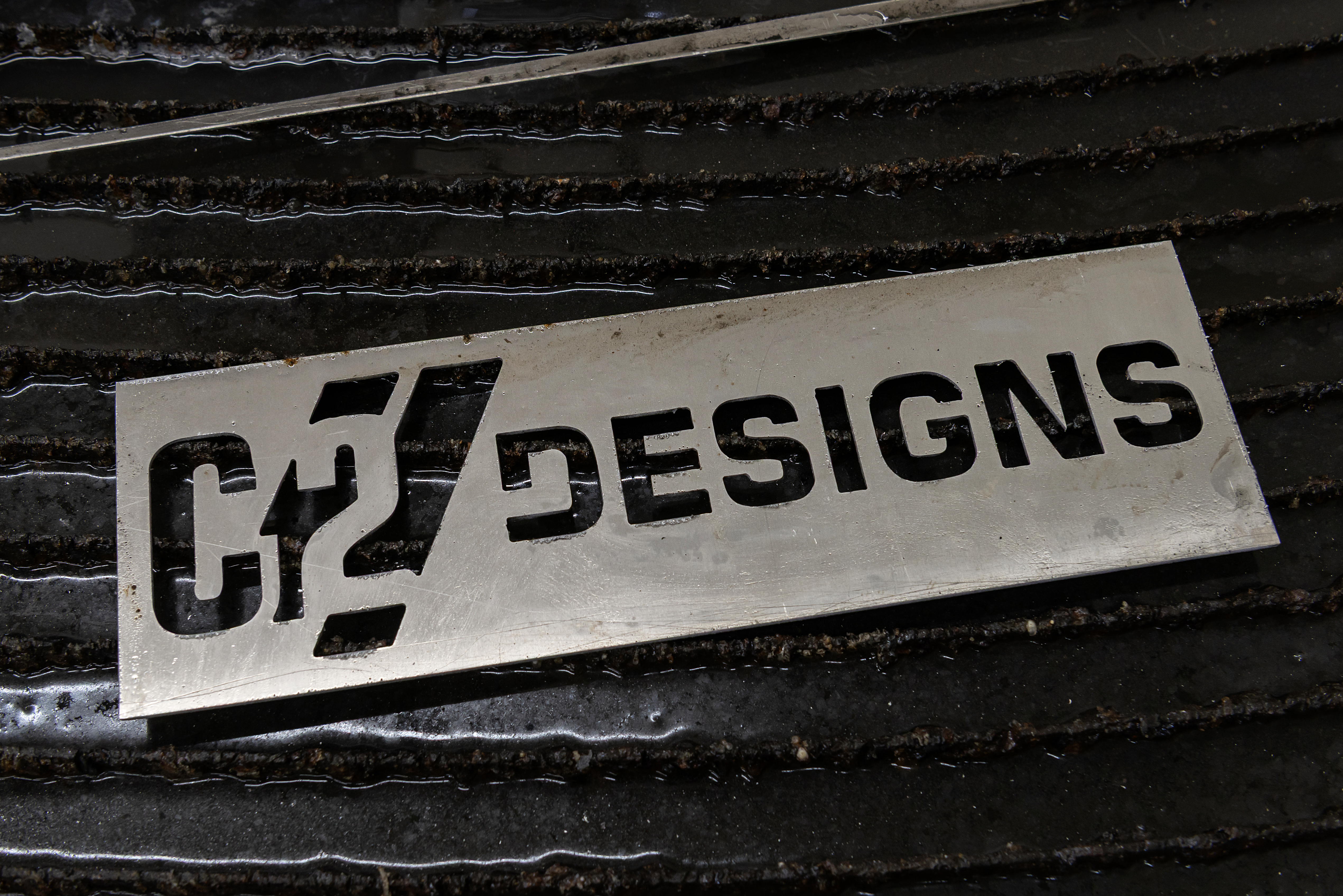 C2 Designs logo cut in steel