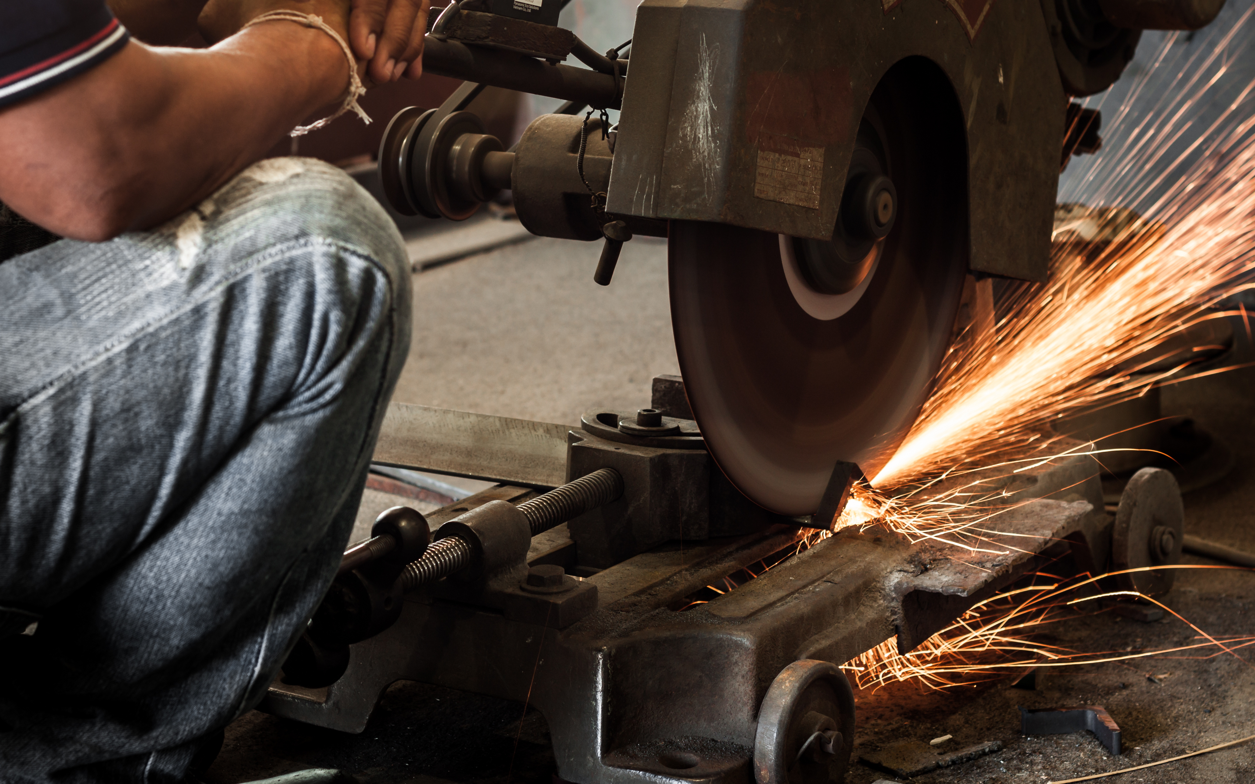 Steel being cut with a shower of sparks