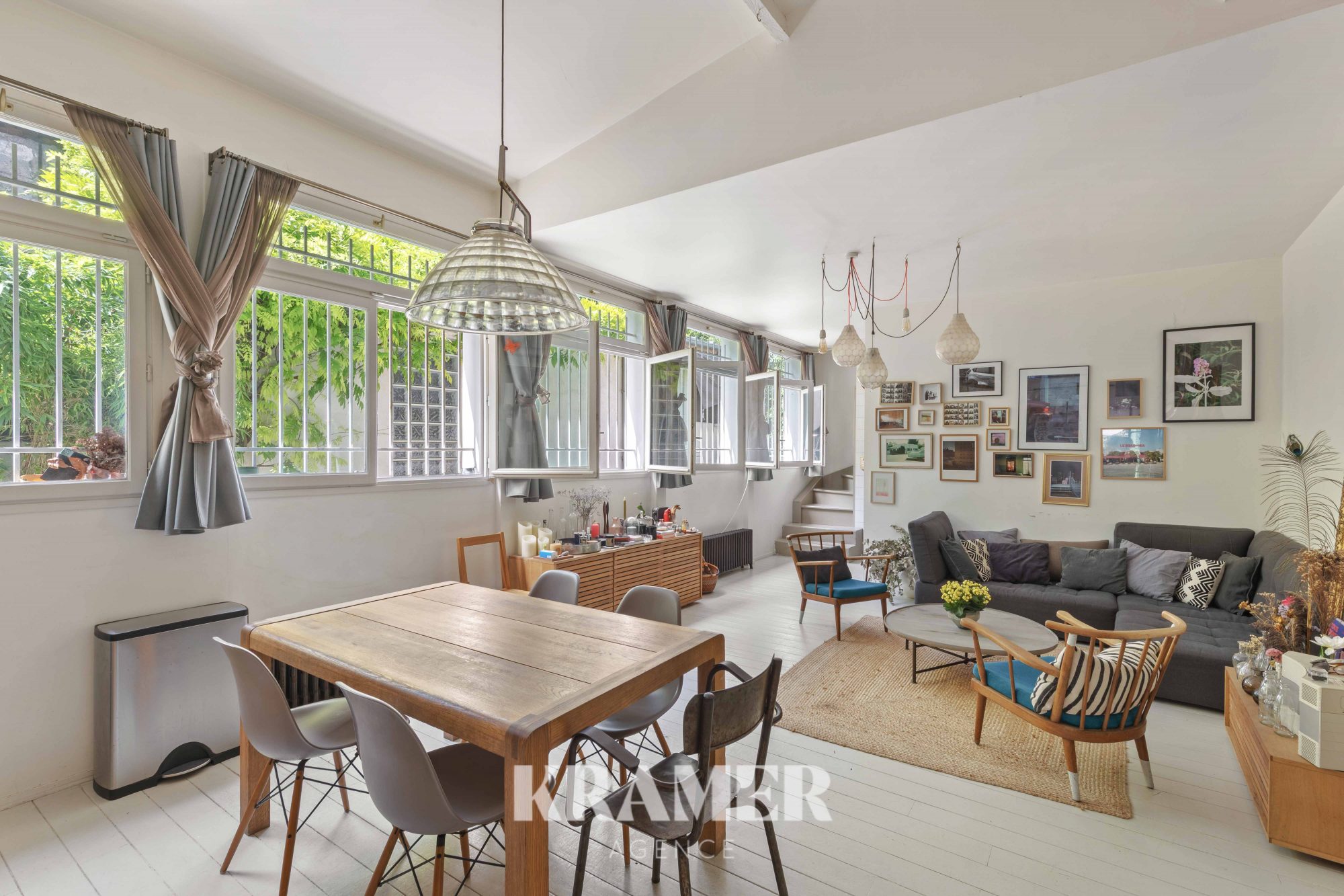 Appartement de 90 m², cinq pièces dont trois chambres, à Paris 20e. En rez-de-chaussée, sans ascenseur et terrasse. 1 050 000 €.