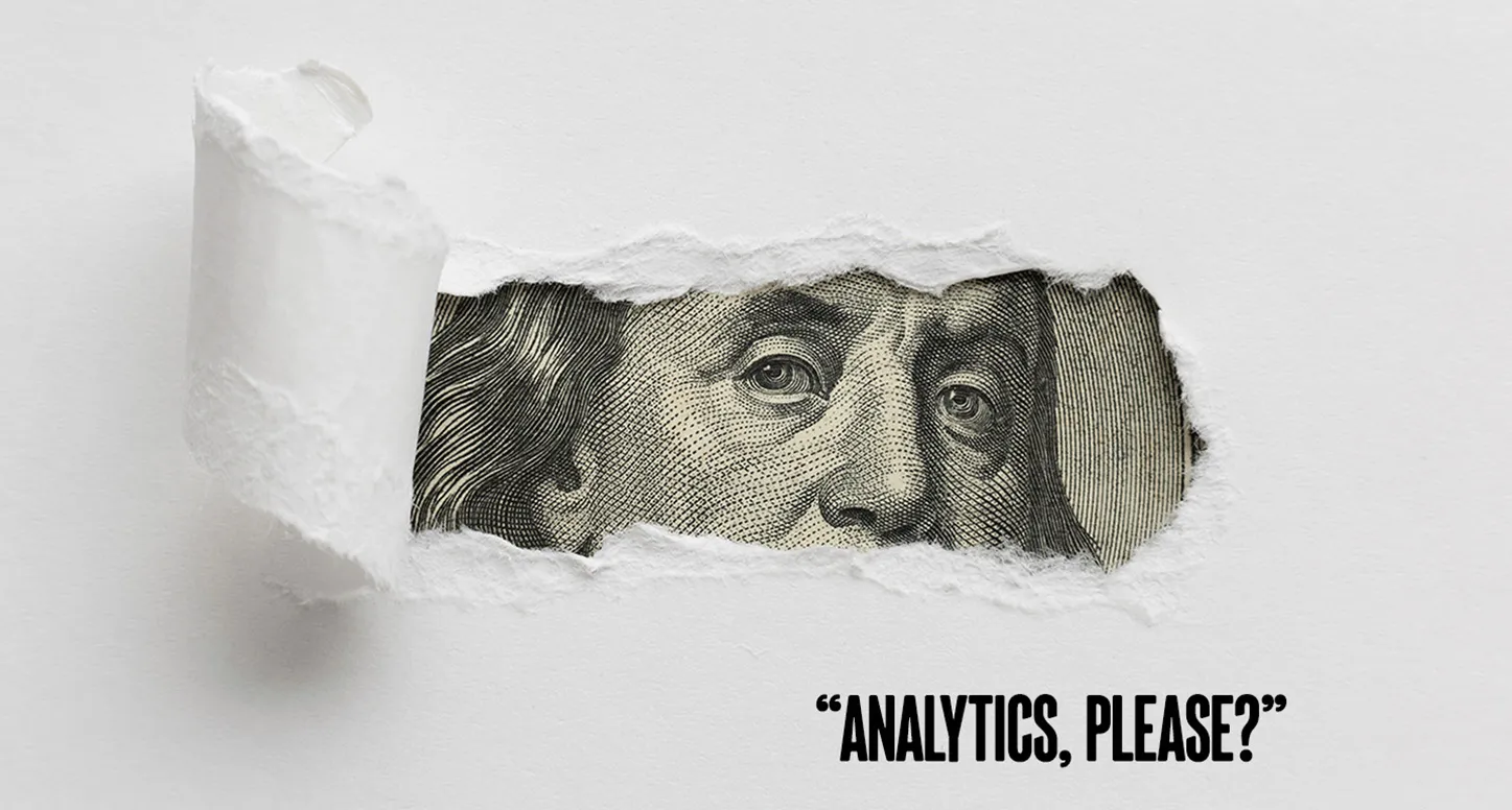 A portion of Benjamin Franklin's face on the hundred dollar bill and "analytics, please?" regarding e-commerce analytics