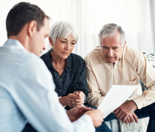 A consultant meeting with a family