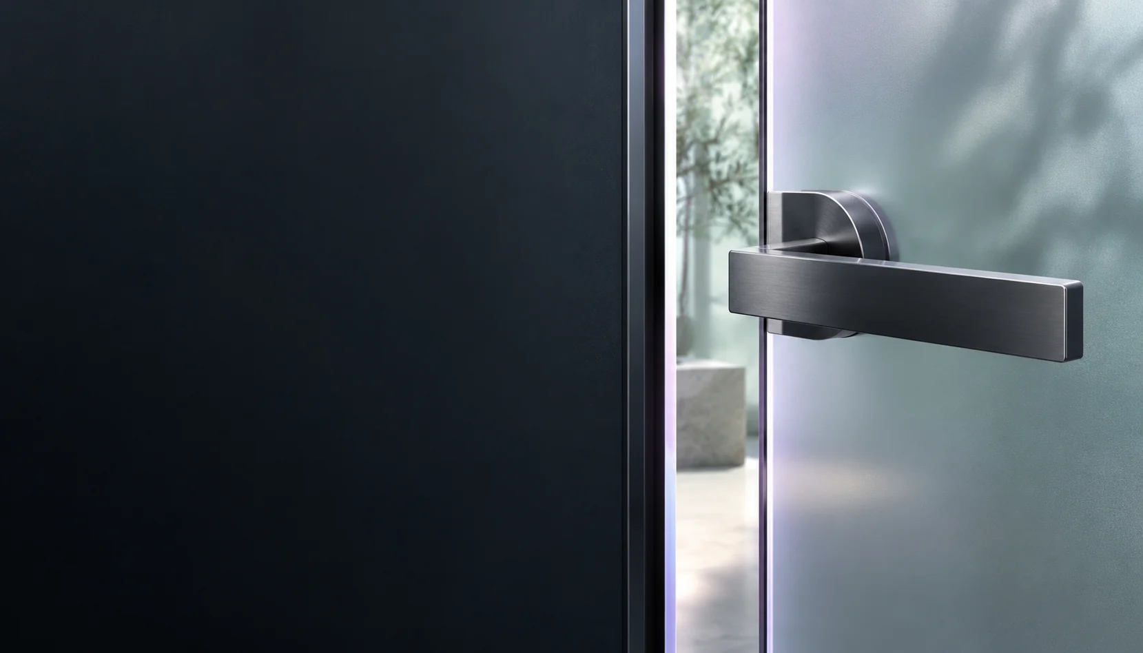 Illustration: A charcoal door handle beside a softly lit frosted-glass opening.