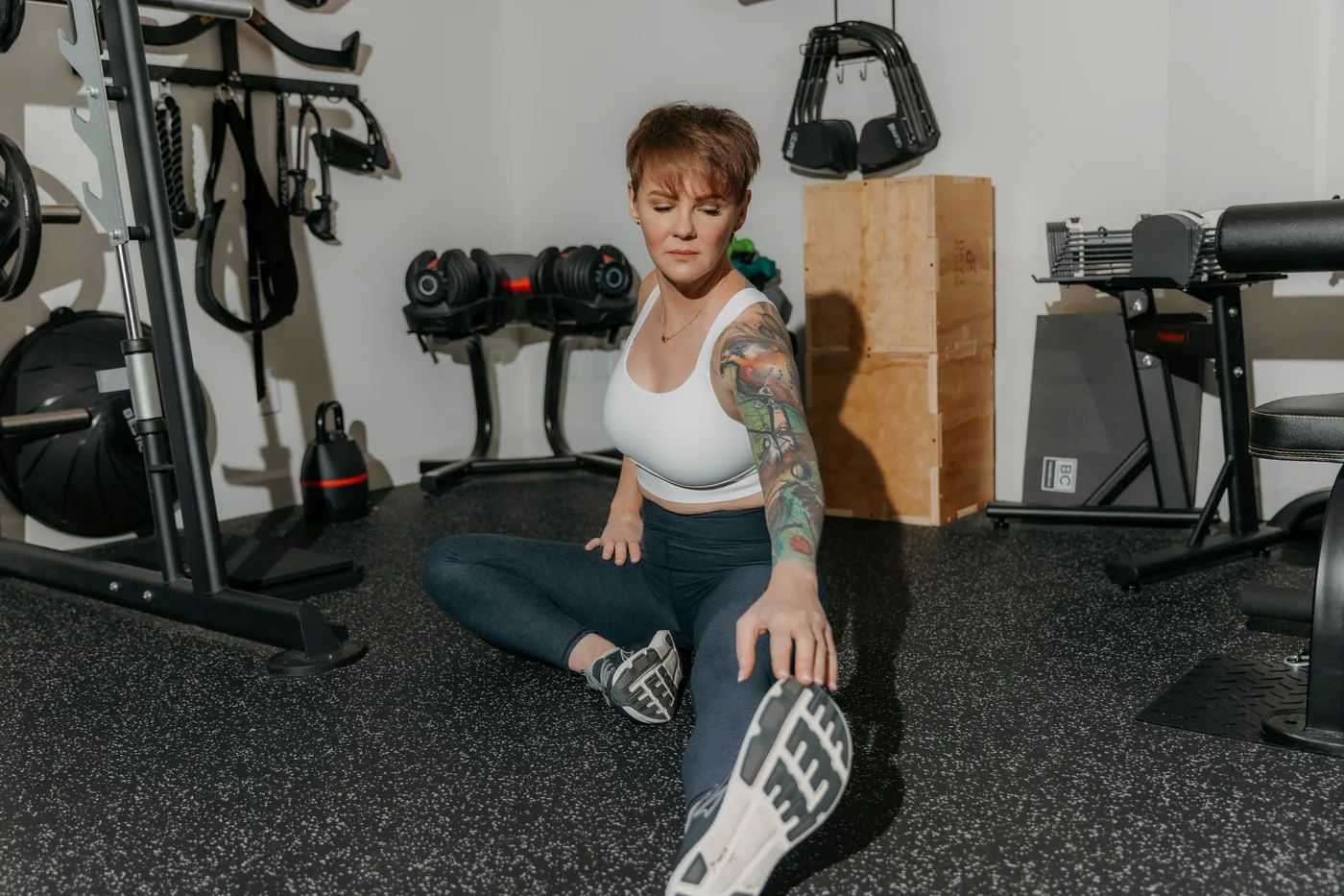Kate Bolia stretching in the Apex Dunwoody training studio.