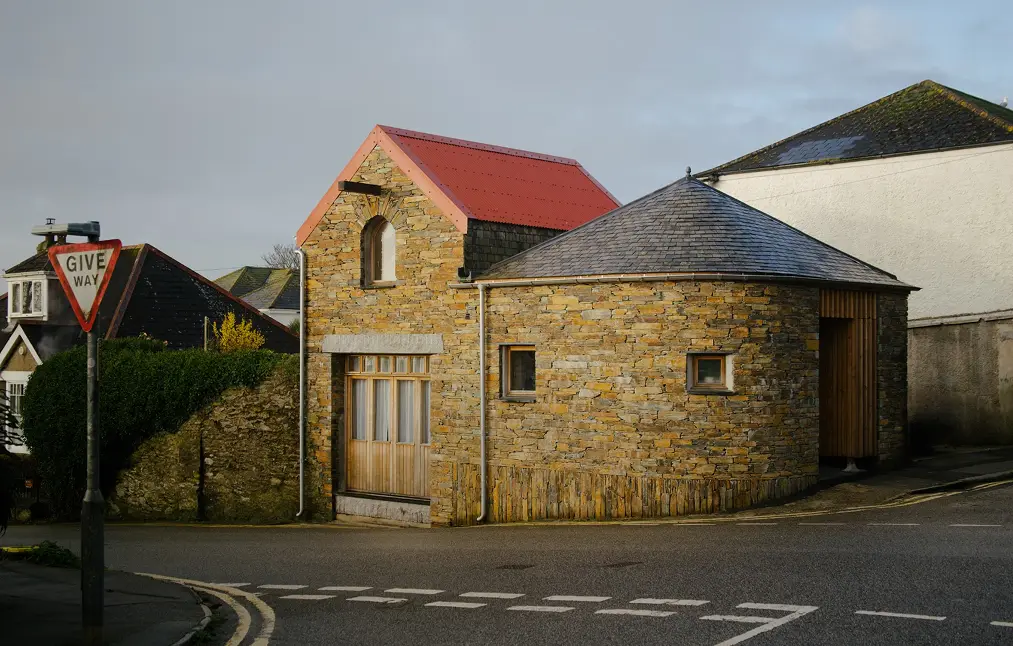 Converted stone barn on a street corner