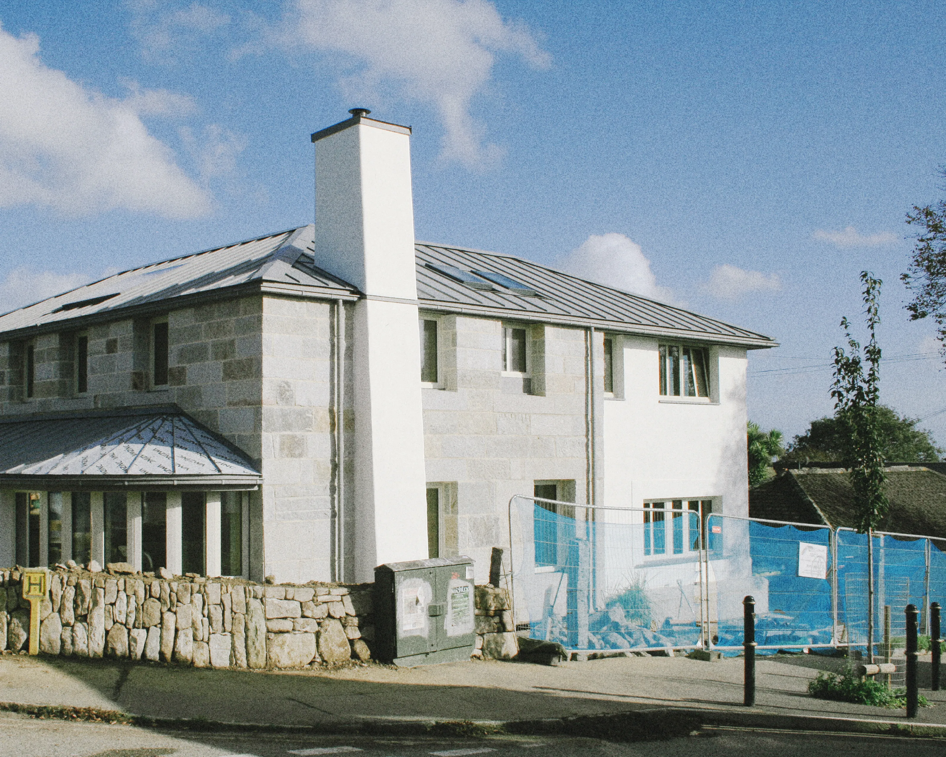 Converted stone barn on a street corner