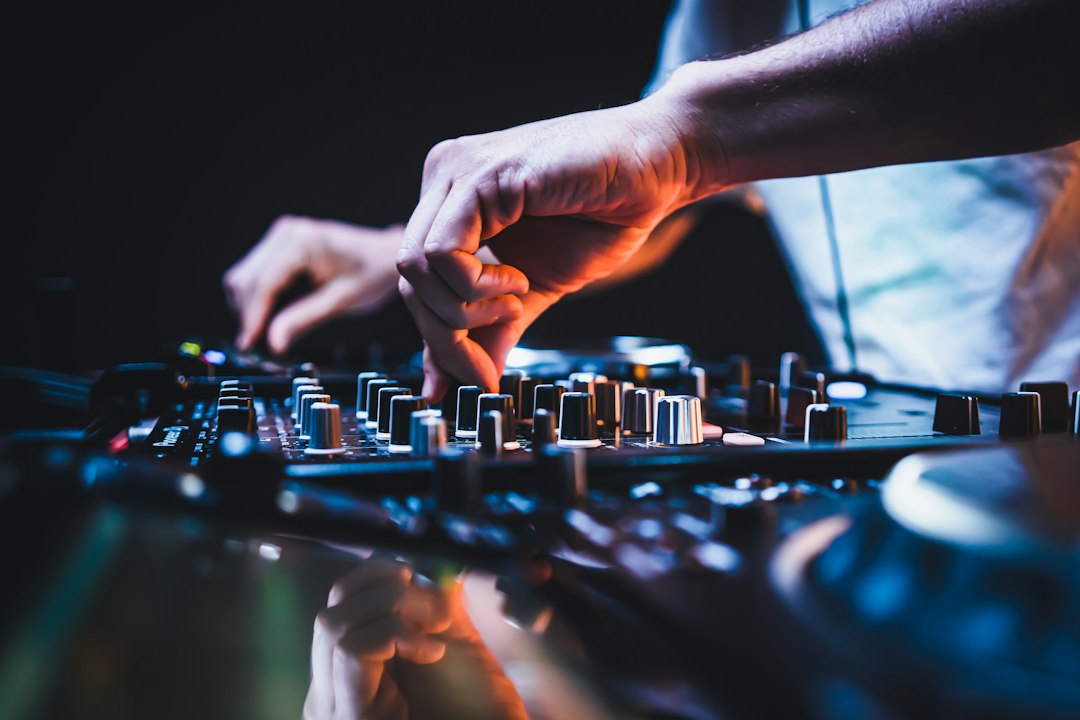 professional DJ audio mixing console overlooking an estate lawn