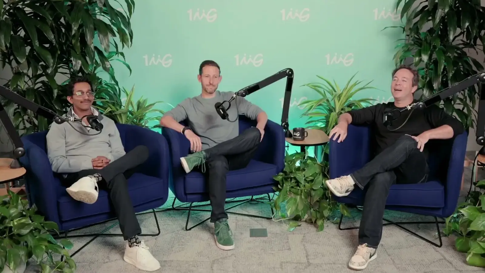 Three speakers in conversation during a Match Group CEO Connection production